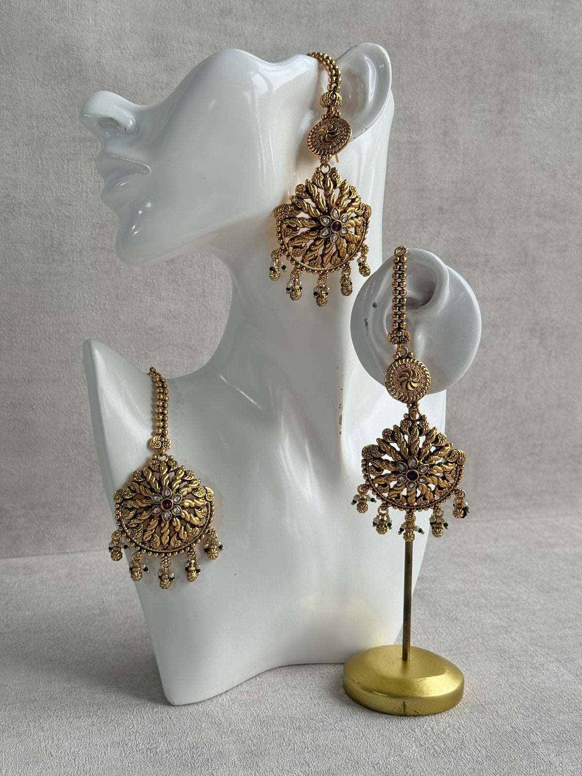 Ayura Designs Survi Tikka Set with Sahare Earrings – Antique Gold with Kundan, Pink Stones, Ivory & Green Beads
