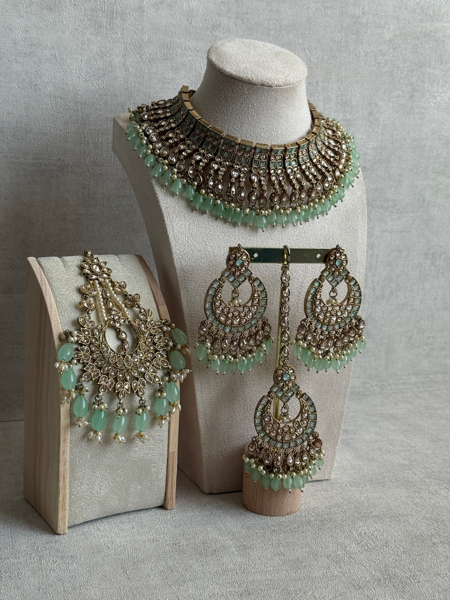 Ayura Designs Sajda Bridal Set with Necklace, Earrings, Tikka & Passa – Pistachio Green Beads, Kundan & Mirror-Cut Detailing