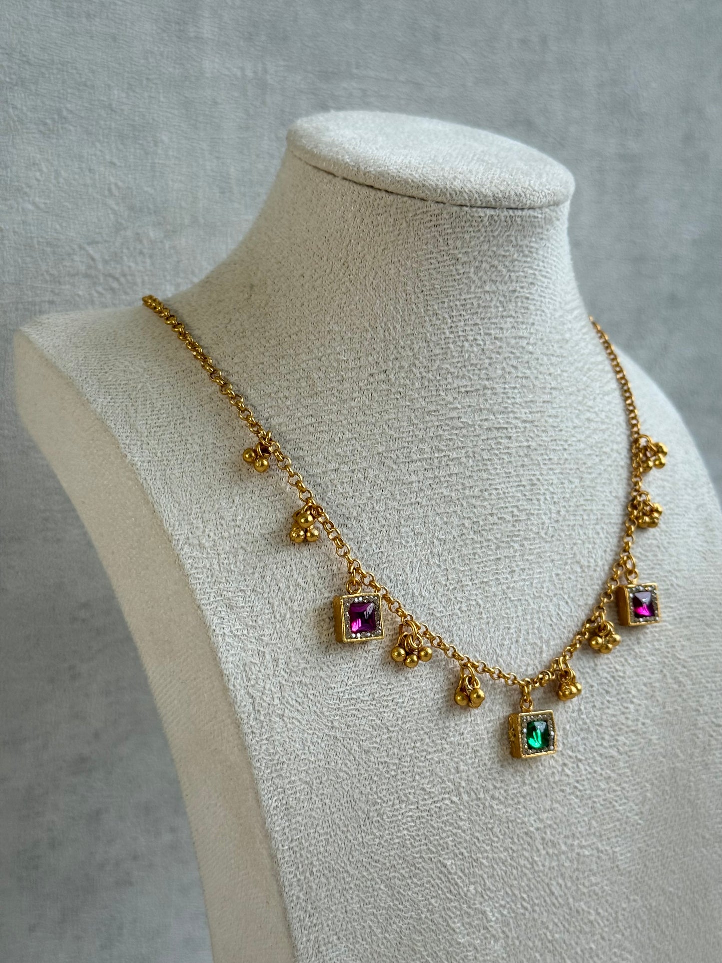 Ayura Designs Smita Set with Necklace & Earrings – Ruby Pink & Emerald Green Stones with Gold-Tone Ghungroo Detailing