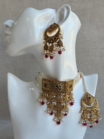 Ayura Designs Samera Choker Set with Earrings & Tikka – Rani Pink Beads, Pearl Detailing, Green Centre Stone, Floral Motifs & Antique Gold Finish