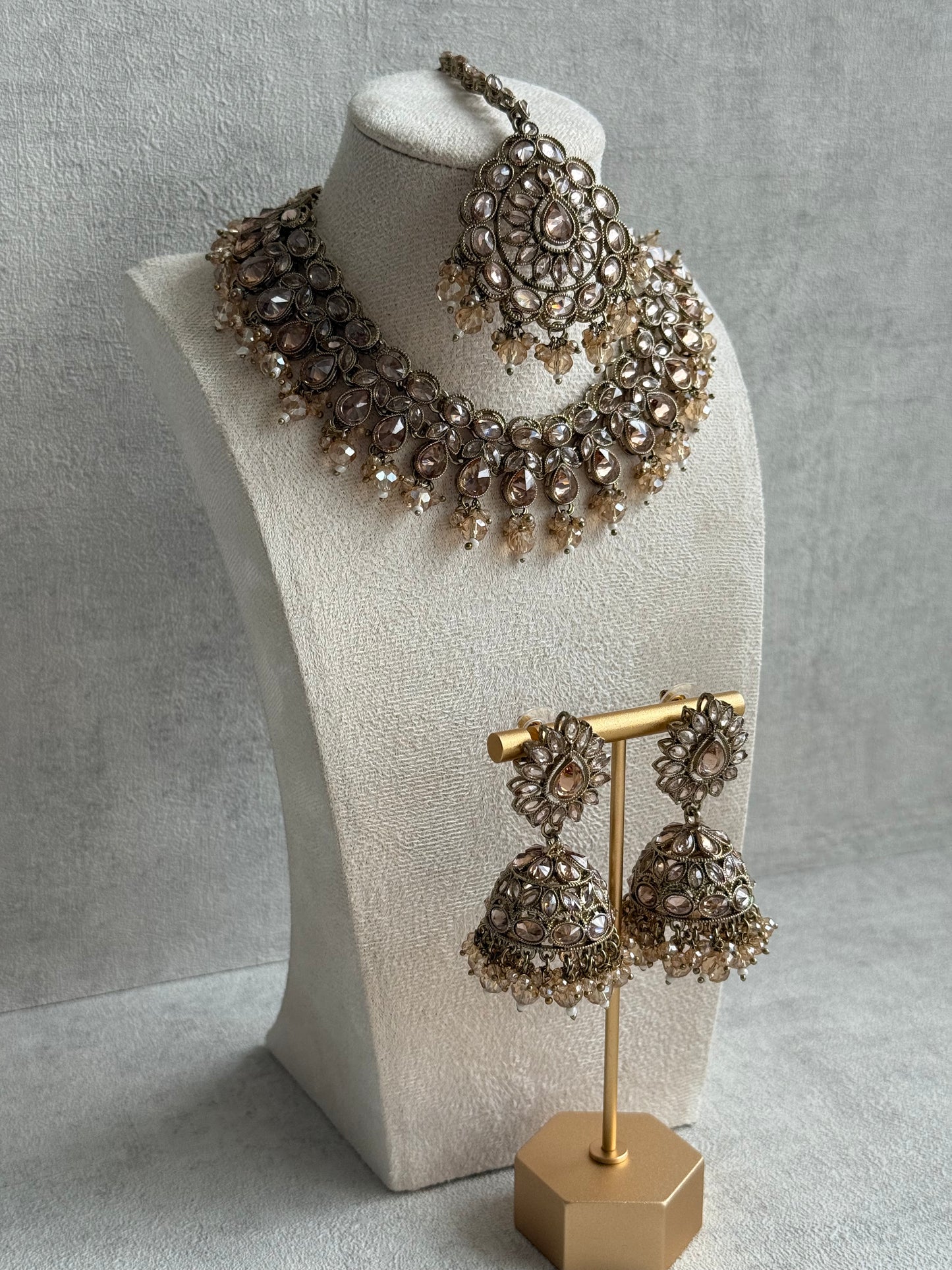 Ayura Designs Emaan Set with Jhumkis & Tikka – Champagne Stones, Antique Gold Finish & Crystal Detailing