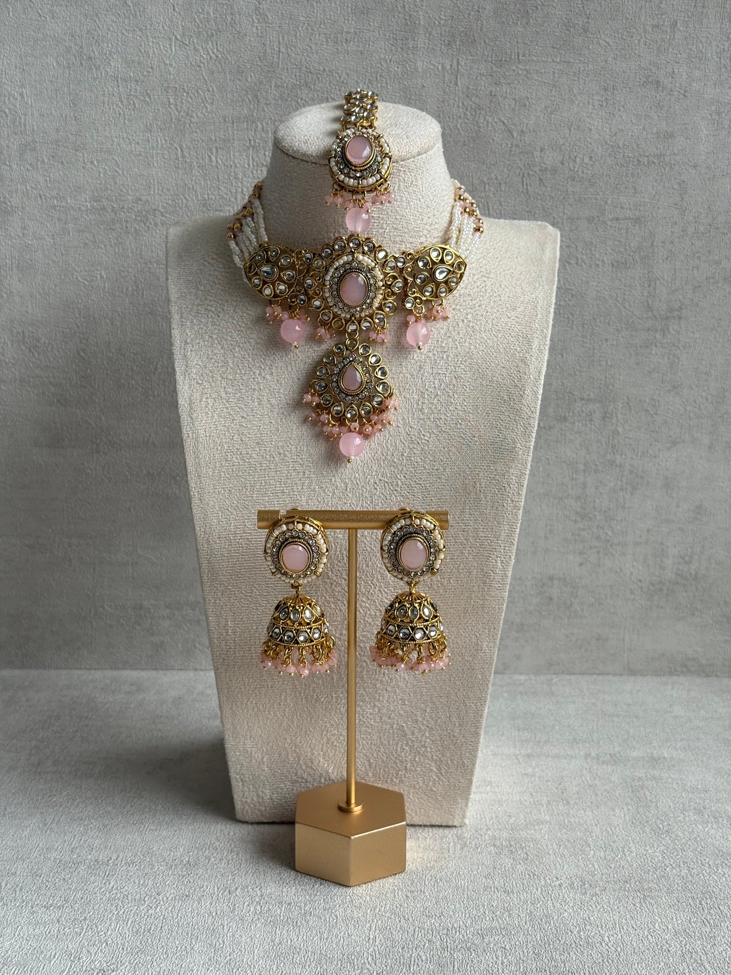 Ayura Designs Muskaan Set – Choker, Jhumkis & Tikka with Blush Pink Beads, Kundan Stones & Antique Gold Finish