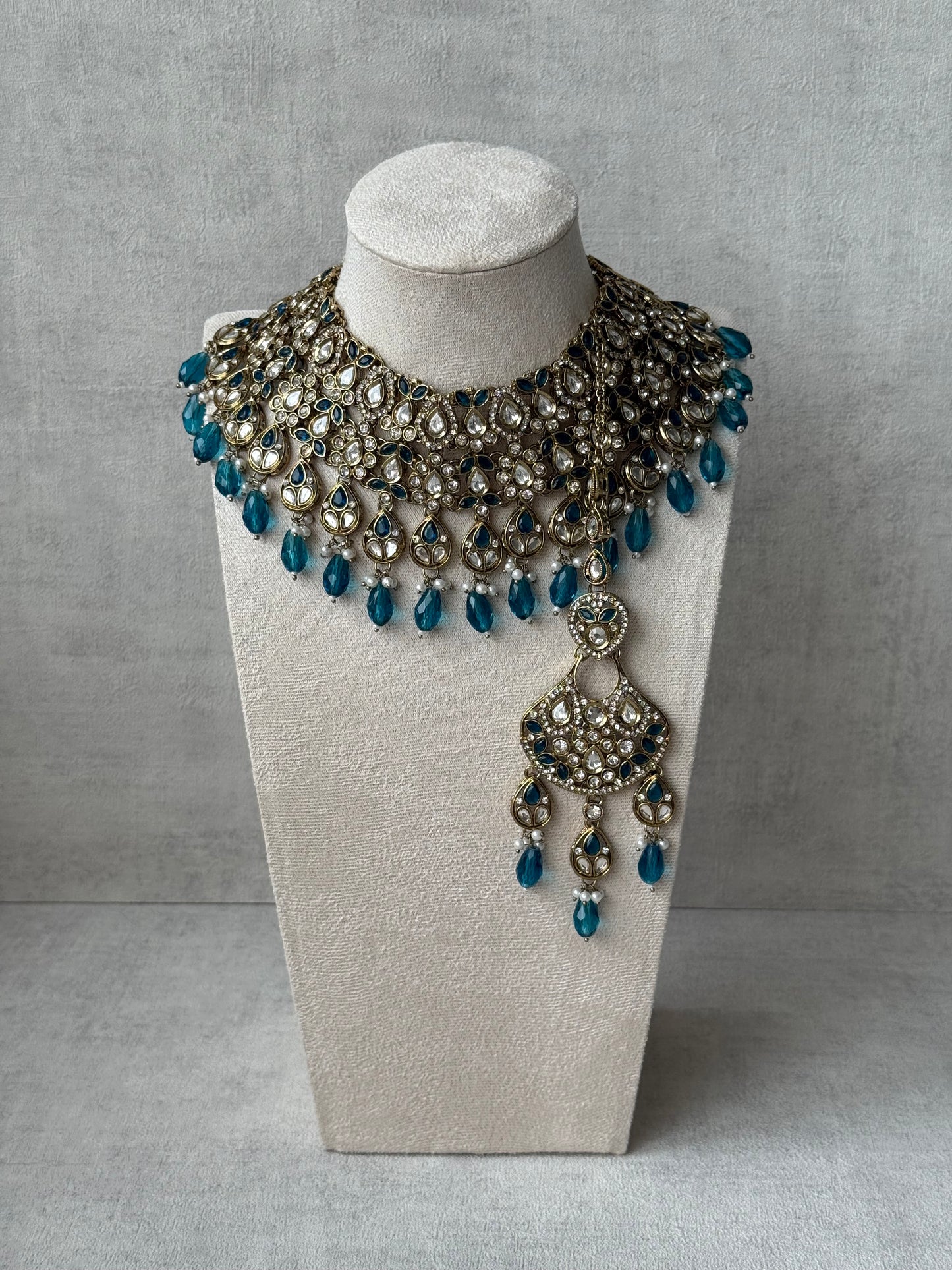 Ayura Designs Hoorain Set with Earrings – Antique Gold Finish, Mirror-Cut Stones & Peacock Blue Beads