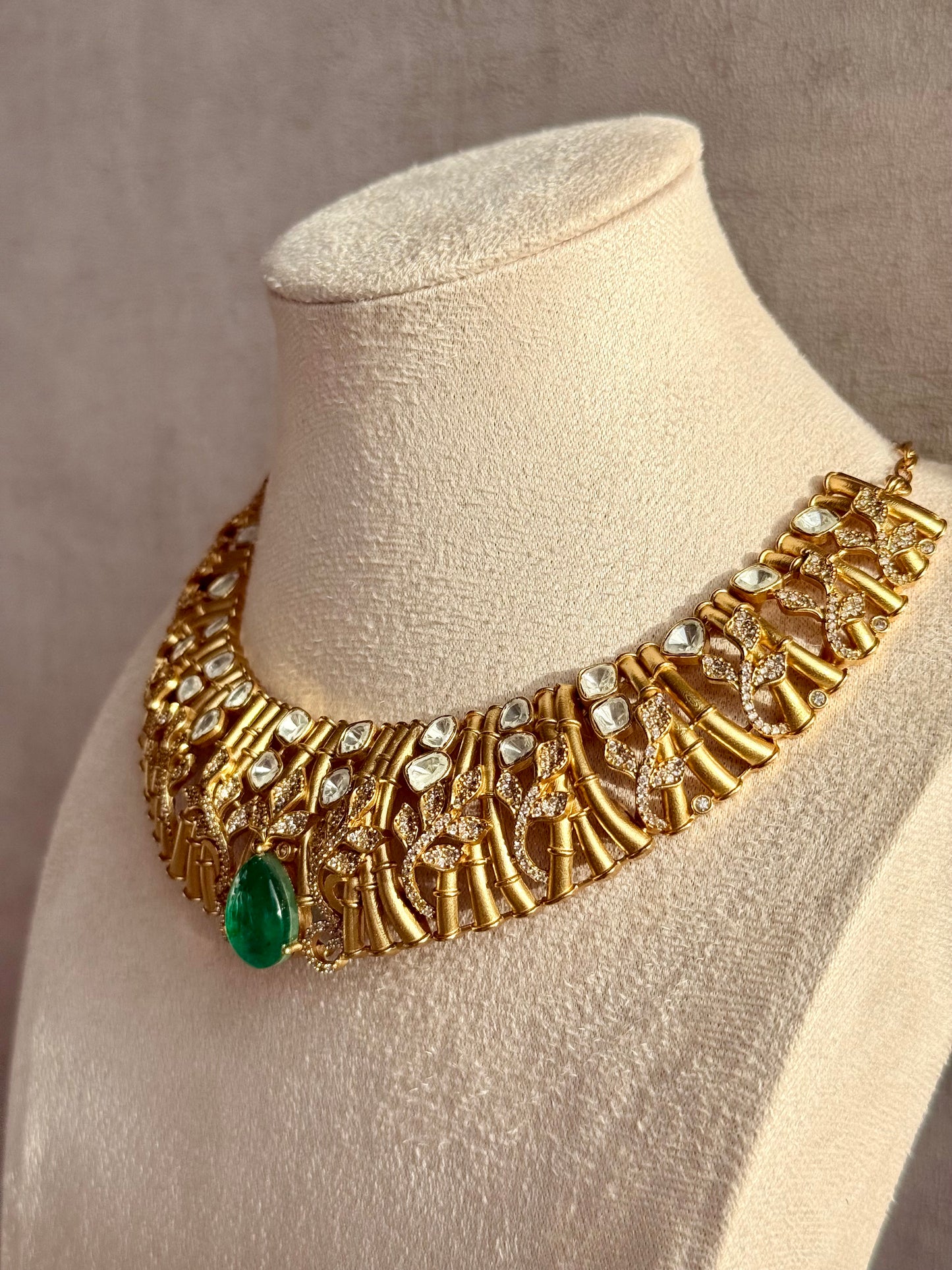 Ayura Designs Rami Collar Set with Jhumkis – Sculpted Gold Collar with Emerald Green Stone and Crystal Detailing