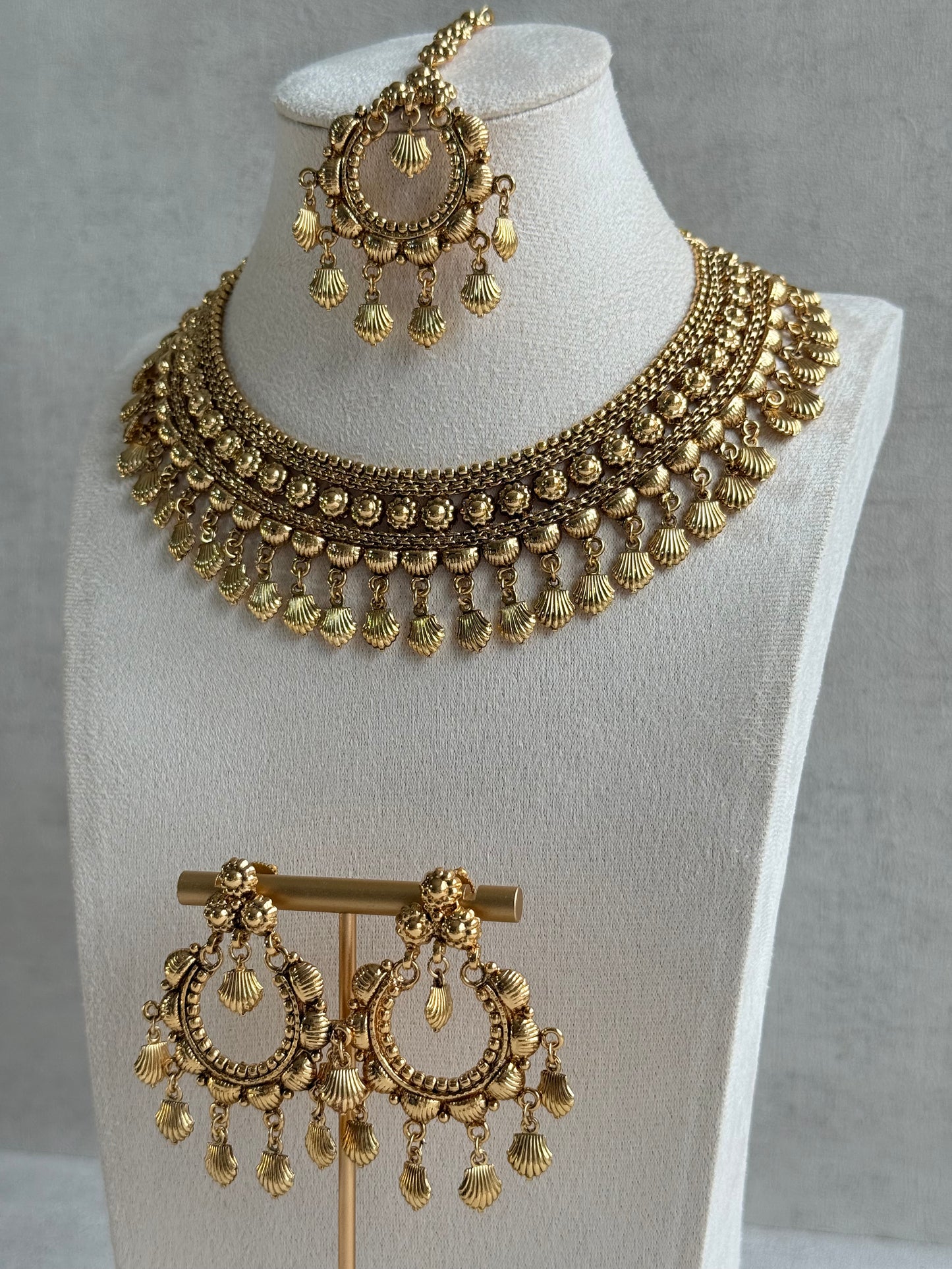 Ayura Designs Falaq Necklace Set with Earrings & Tikka – Gold Finish with Layered Chain, Floral & Shell Drop Detailing