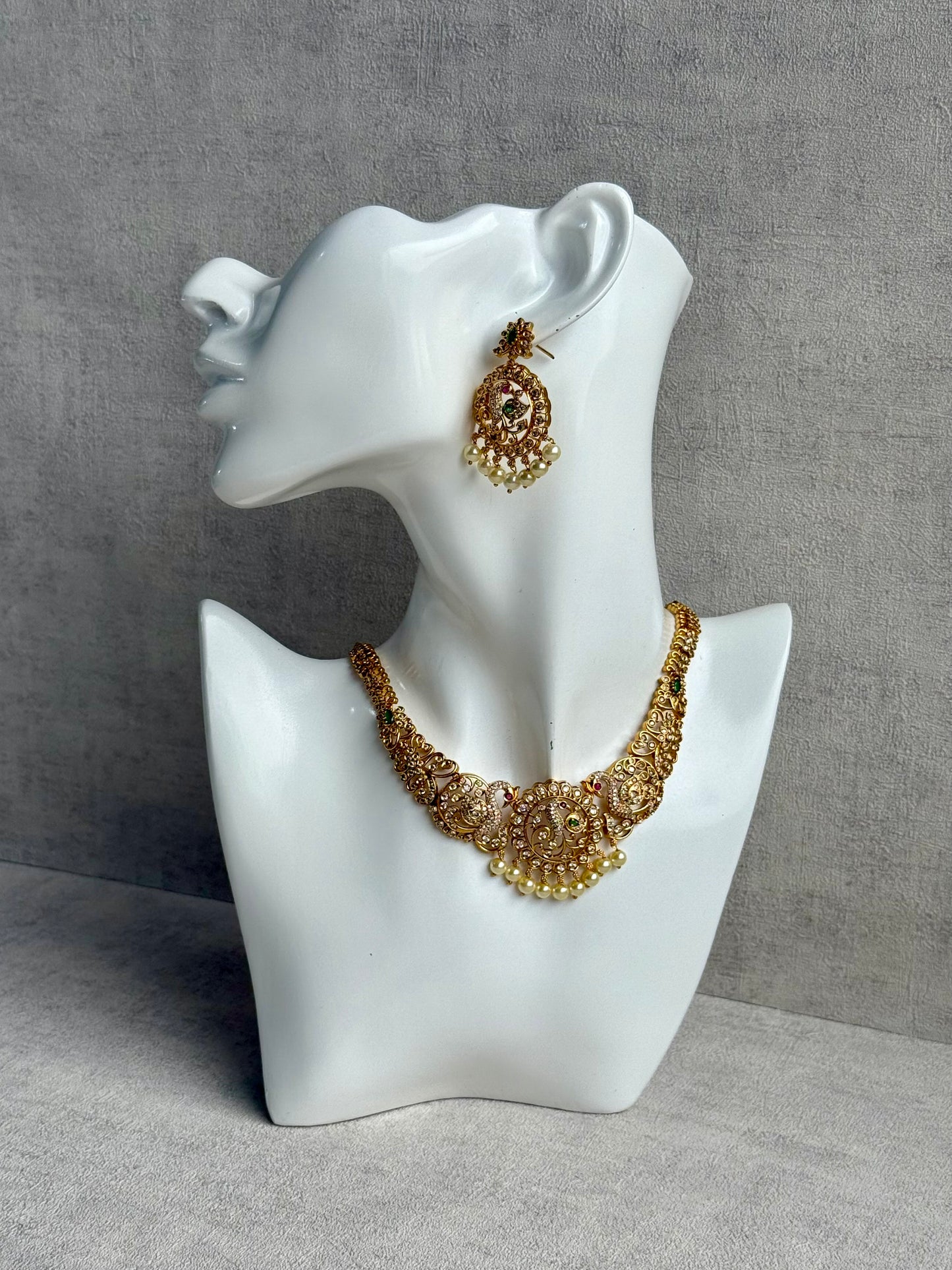 Ayura Designs Vedya Set – Antique Gold Peacock Necklace with Kundan, Emerald & Pearl Detailing