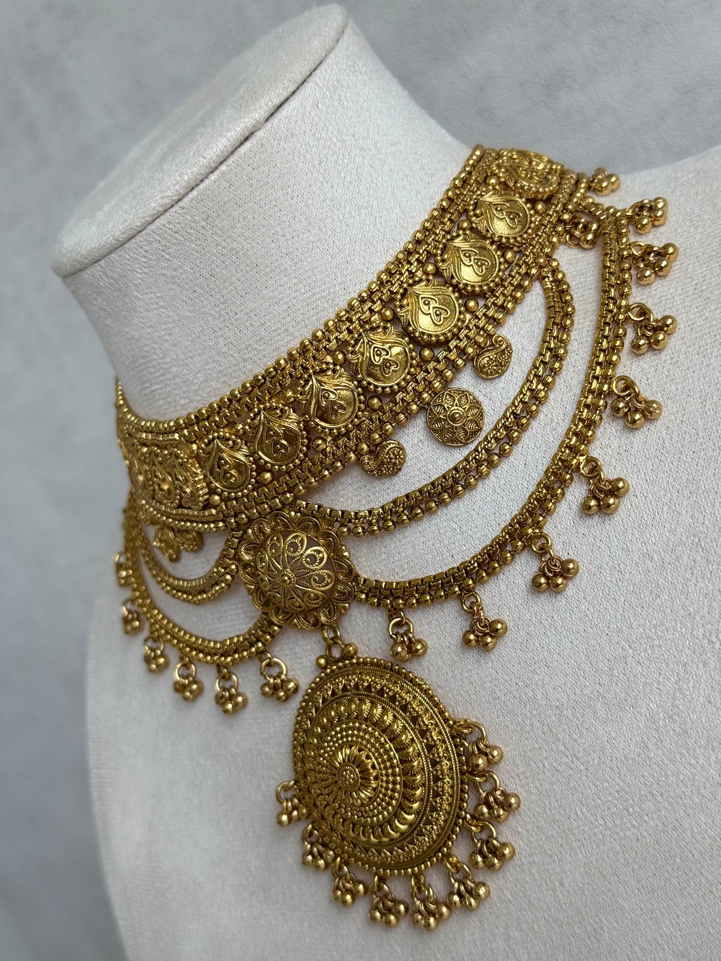 Ayura Designs Subha Choker Set with Earrings & Passa – Antique Gold Engraved Medallions, Layered Chains & Ghungroo Drops