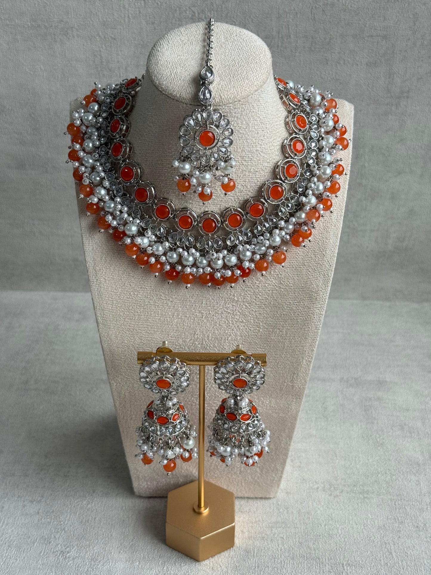 Ayura Designs Barira Set – Necklace, Jhumkis & Tikka with Orange Stones, Pearls & Antique Silver Finish