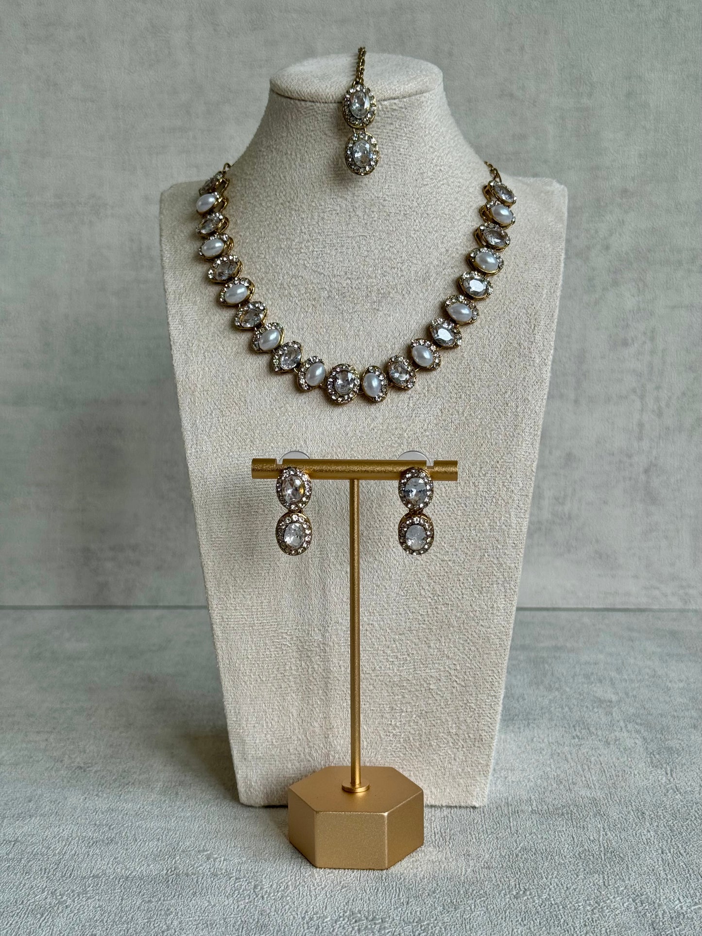 Ayura Designs Eira Set – Necklace, Earrings & Tikka with Diamond-Cut & Ivory Oval Stones in Antique Gold