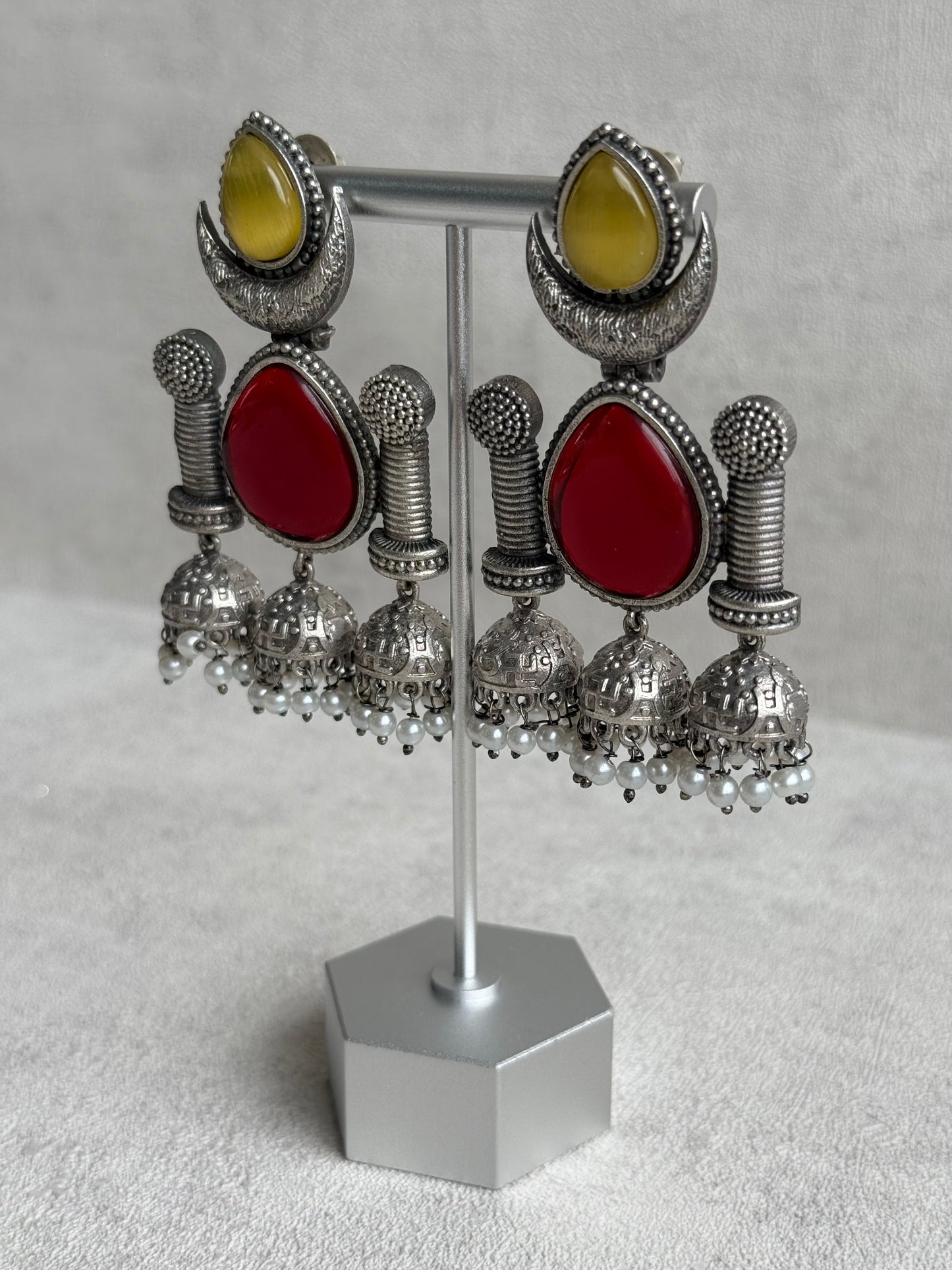 Ayura Designs Qissa Earrings – Oxidised Triple Jhumki Earrings with Ruby Red Stones & Pearl Detailing