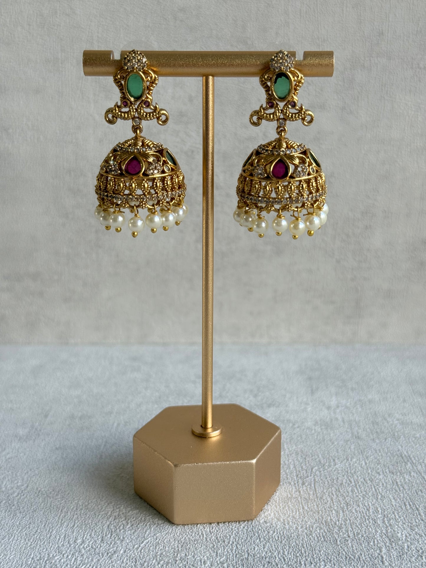 Ayura Designs Ehla Jhumkis – Gold Peacock Design with Green & Ruby Pink Stones, Crystals & Pearl Drops