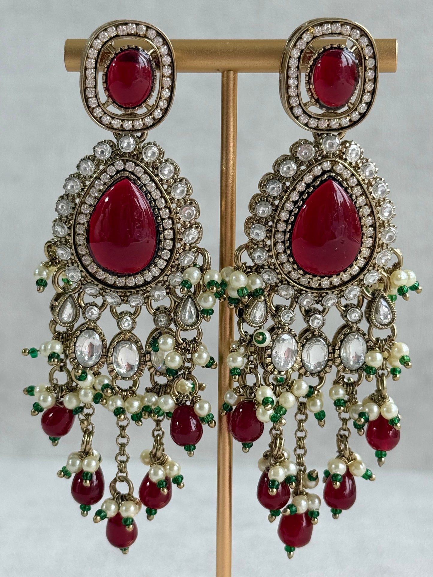 Ayura Designs Sahra Bridal Set with Earrings & Tikka – Ruby Red, Kundan Stones, Pearls & Emerald Green Accents in Antique Gold Finish