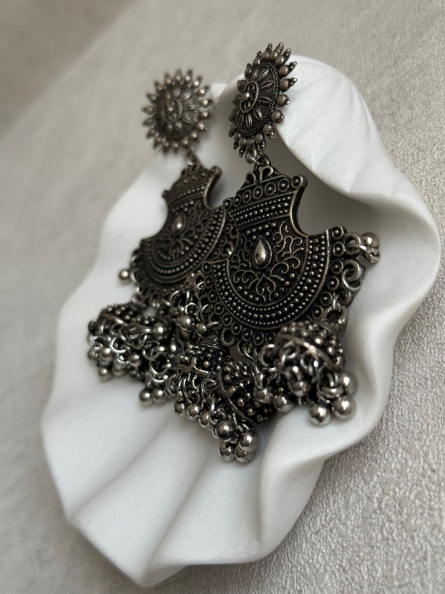 Ayura Designs Mahfar Earrings – Oxidised Silver Jhumkas with Sunburst Tops & Triple Dome Drops