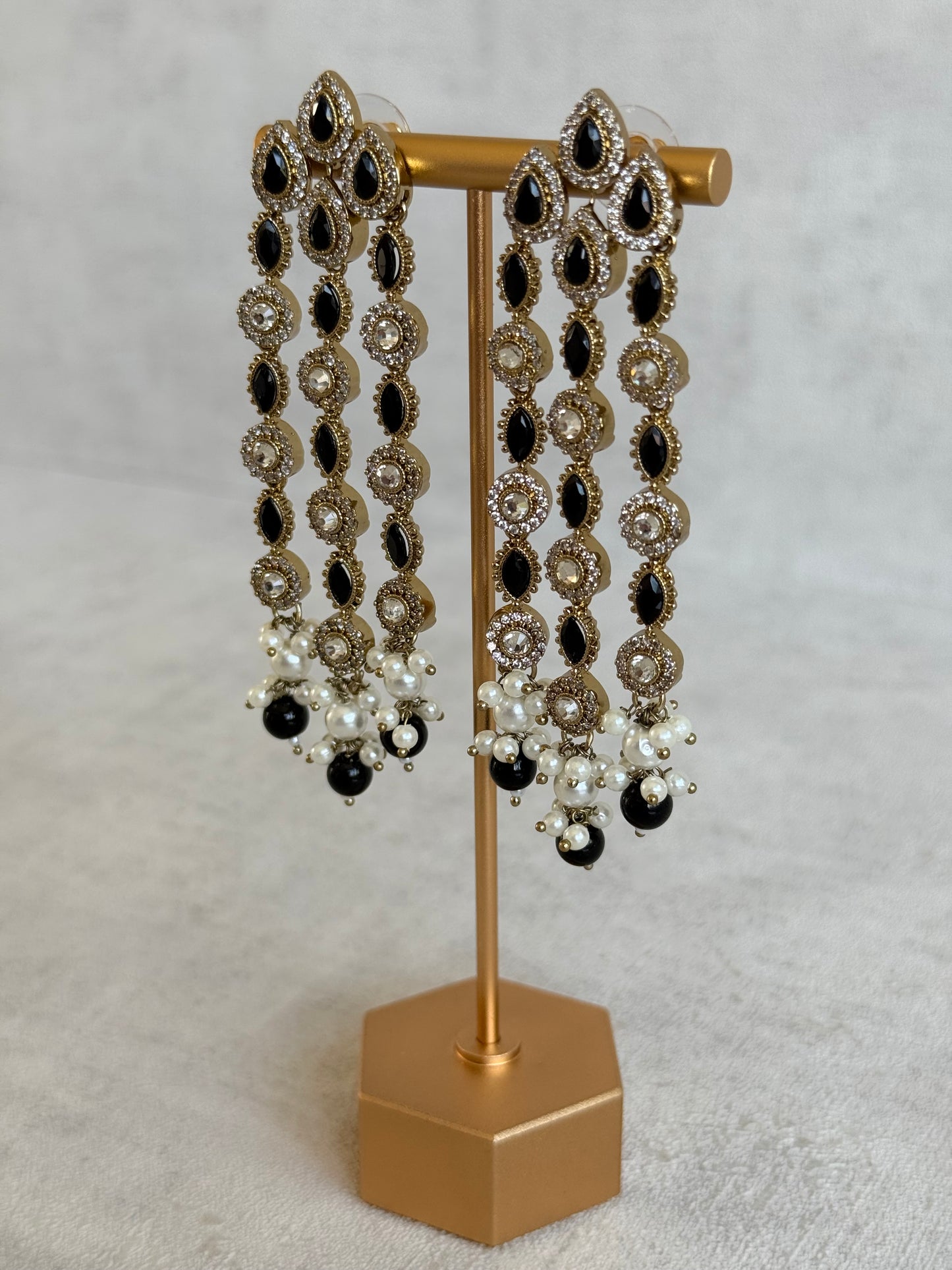 Ayura Designs Emilia Earrings – Gold Triple Strand Statement Earrings with Black Stones & Pearl Drops