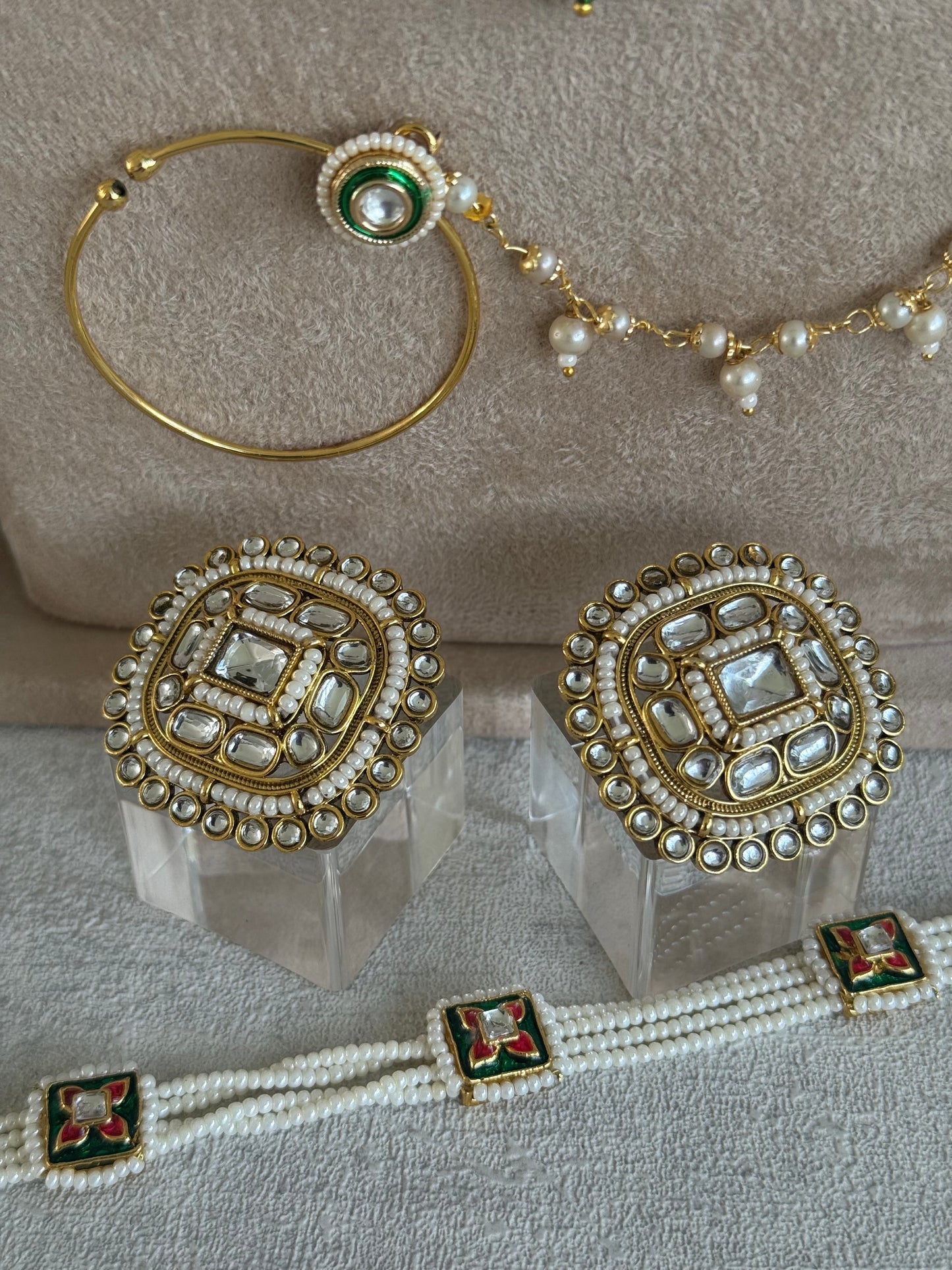 Ayura Designs Malika Bridal Set with Necklace, Jhumkis, Tikka, Nath, Ring & Sheeshphool – Jadau Kundan Craftsmanship with Mirror-Cut Polki, Emerald Green Drops, Ruby Accents & Antique Gold Finish