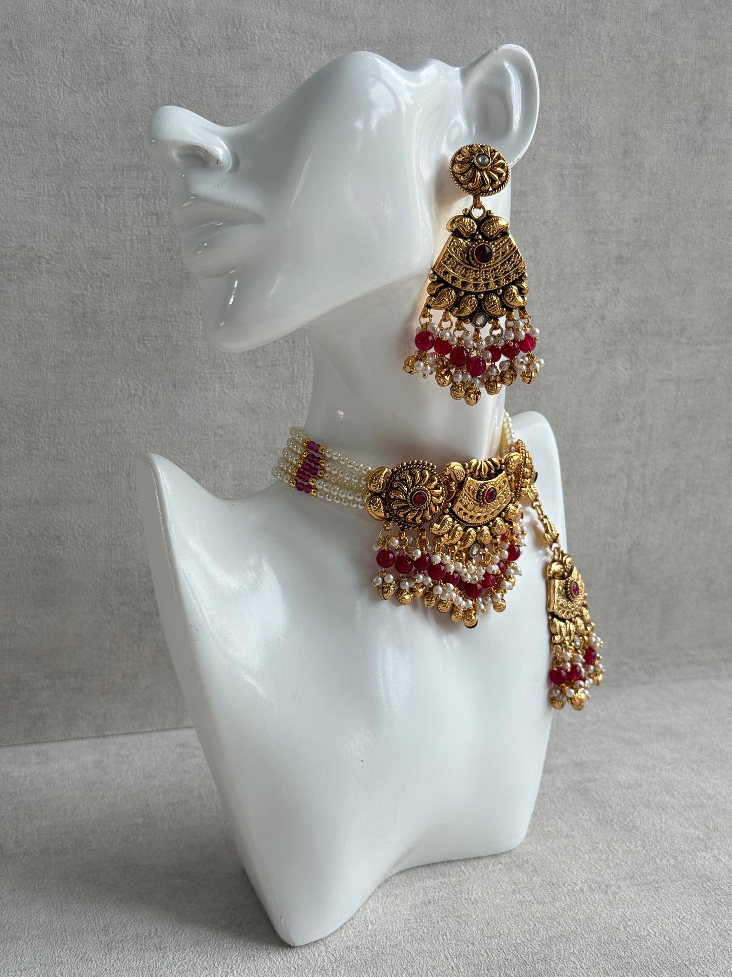 Ayura Designs Sairish Choker Set with Earrings & Tikka – Ruby Pink Beads, Pearl Detailing, Ghungroos, Paisley Motifs & Antique Gold Finish