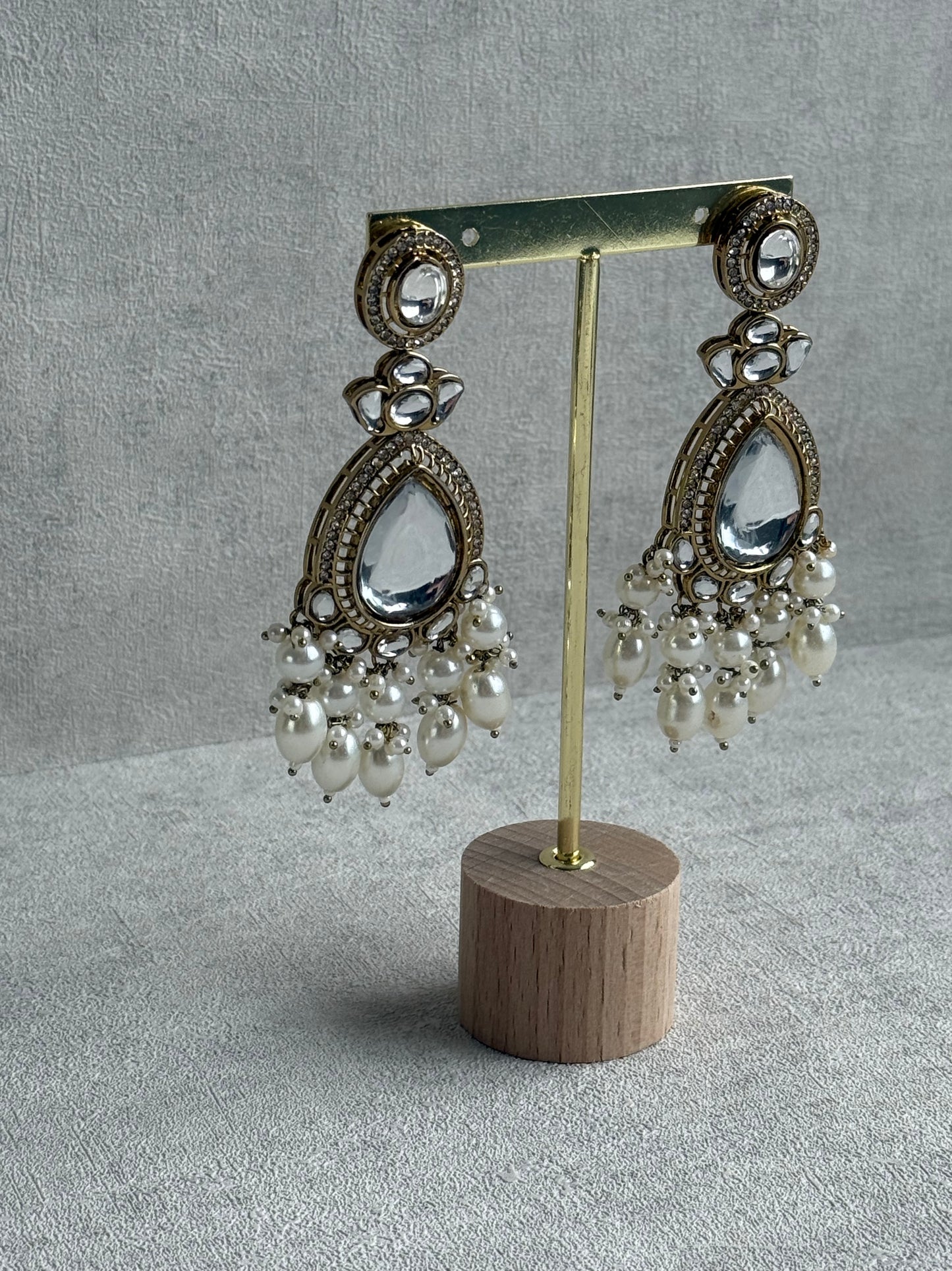 Ayura Designs Nageen Earrings – Antique Gold Jhumkis with Mirror-Cut Stones & Ivory Pearl Drops