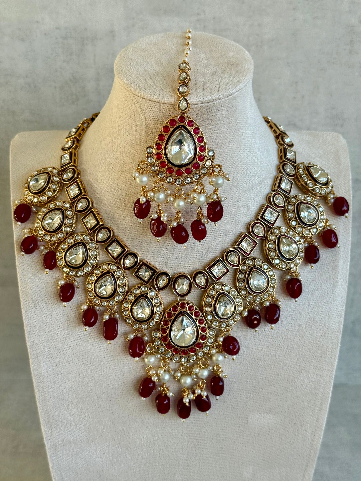 Ayura Designs Ishyat Set with Necklace, Earrings & Tikka – Kundan Detailing, Ruby Red Drops & Ivory Pearls