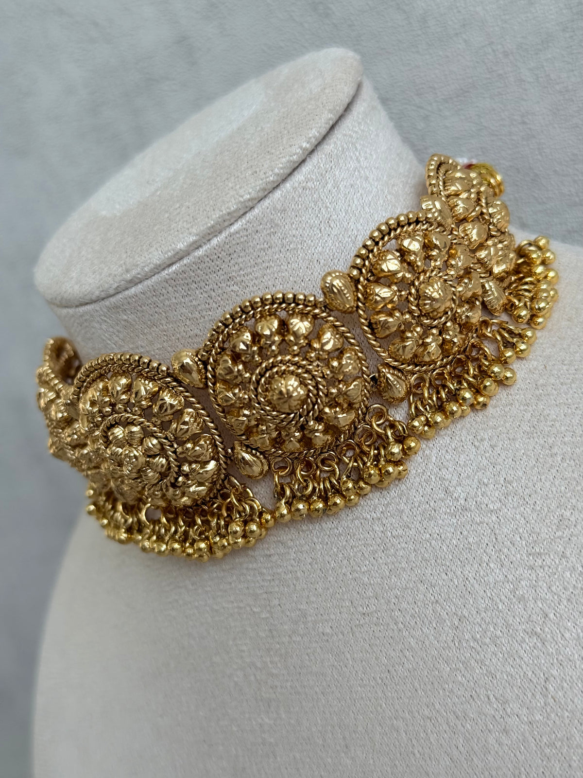 Ayura Designs Nawabi Choker Set with Jhumkis & Tikka – Traditional Gold Tone Bridal Choker with Floral Motifs & Ghungroo Detailing