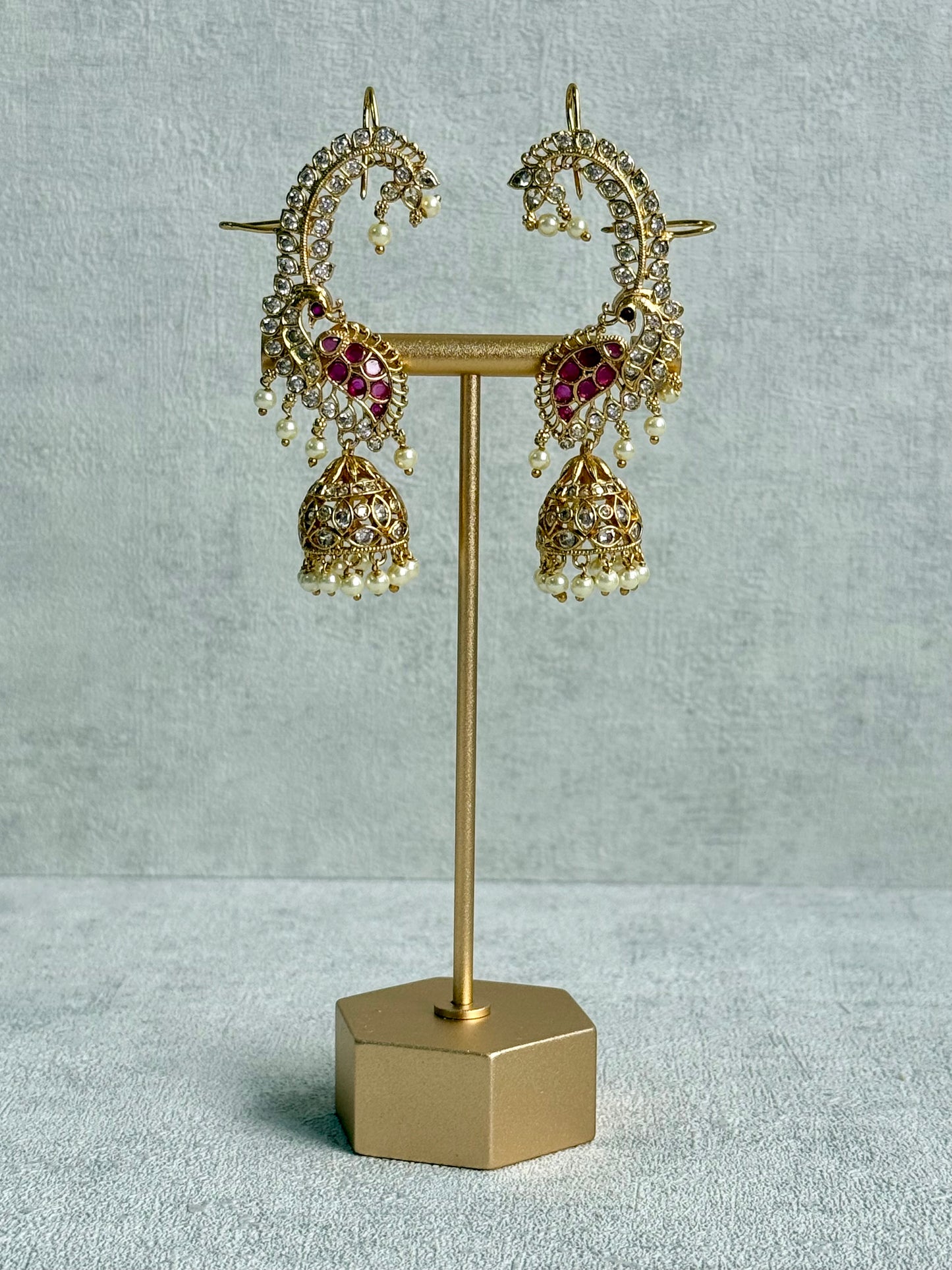 Ayura Designs Padma Earrings – Gold Half Ear Cuffs with Peacock Motif, Pink Stone Accents, Kundan Crystals & Pearl Jhumka Drops