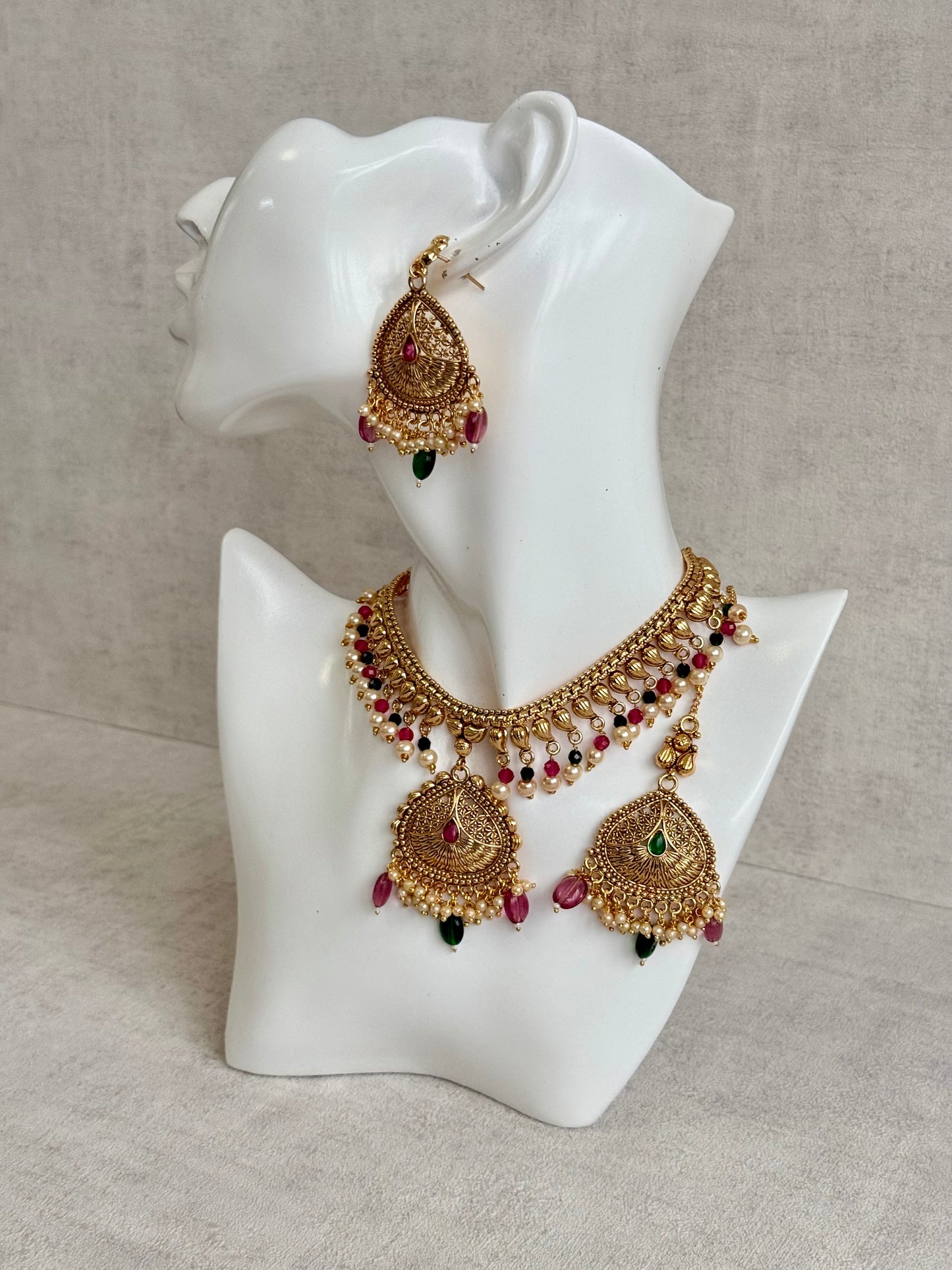 Ayura Designs Hamida Set with Necklace, Earrings & Tikka – Antique Gold with Ruby Pink and Emerald Green Beads & Pearl Detailing