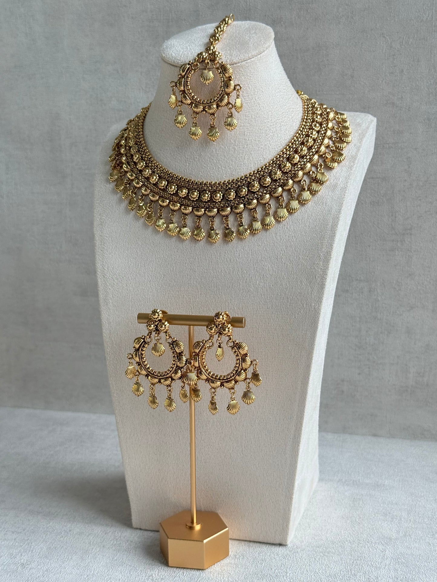 Ayura Designs Falaq Necklace Set with Earrings & Tikka – Gold Finish with Layered Chain, Floral & Shell Drop Detailing