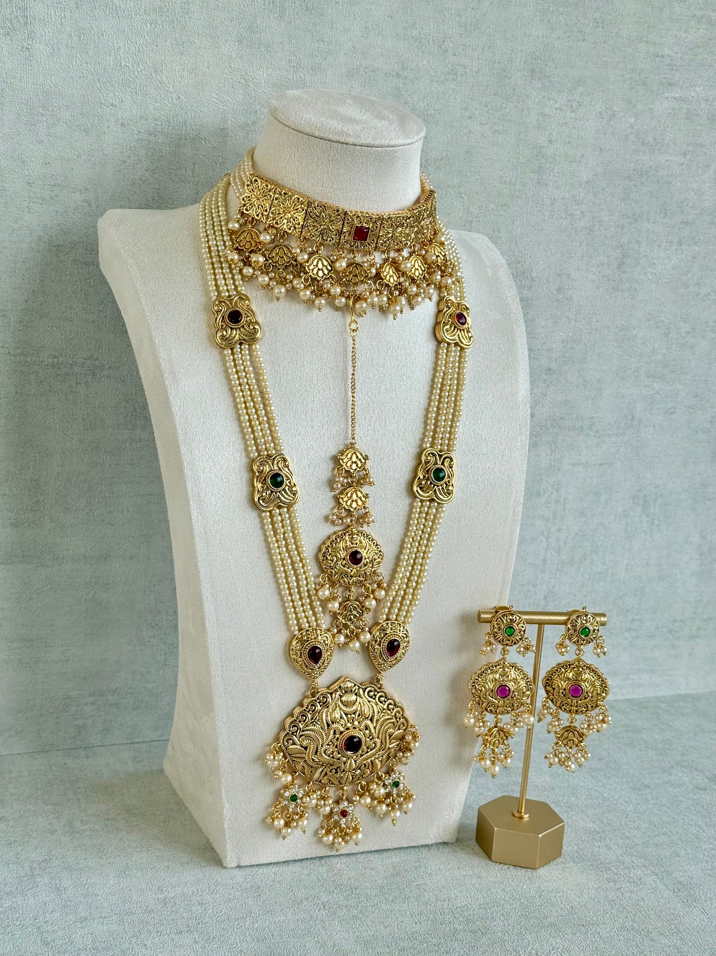 Ayura Designs Maharani Bridal Set with Choker, Haar, Earrings & Tikka – Antique Gold with Pink Stones & Pearl Detailing