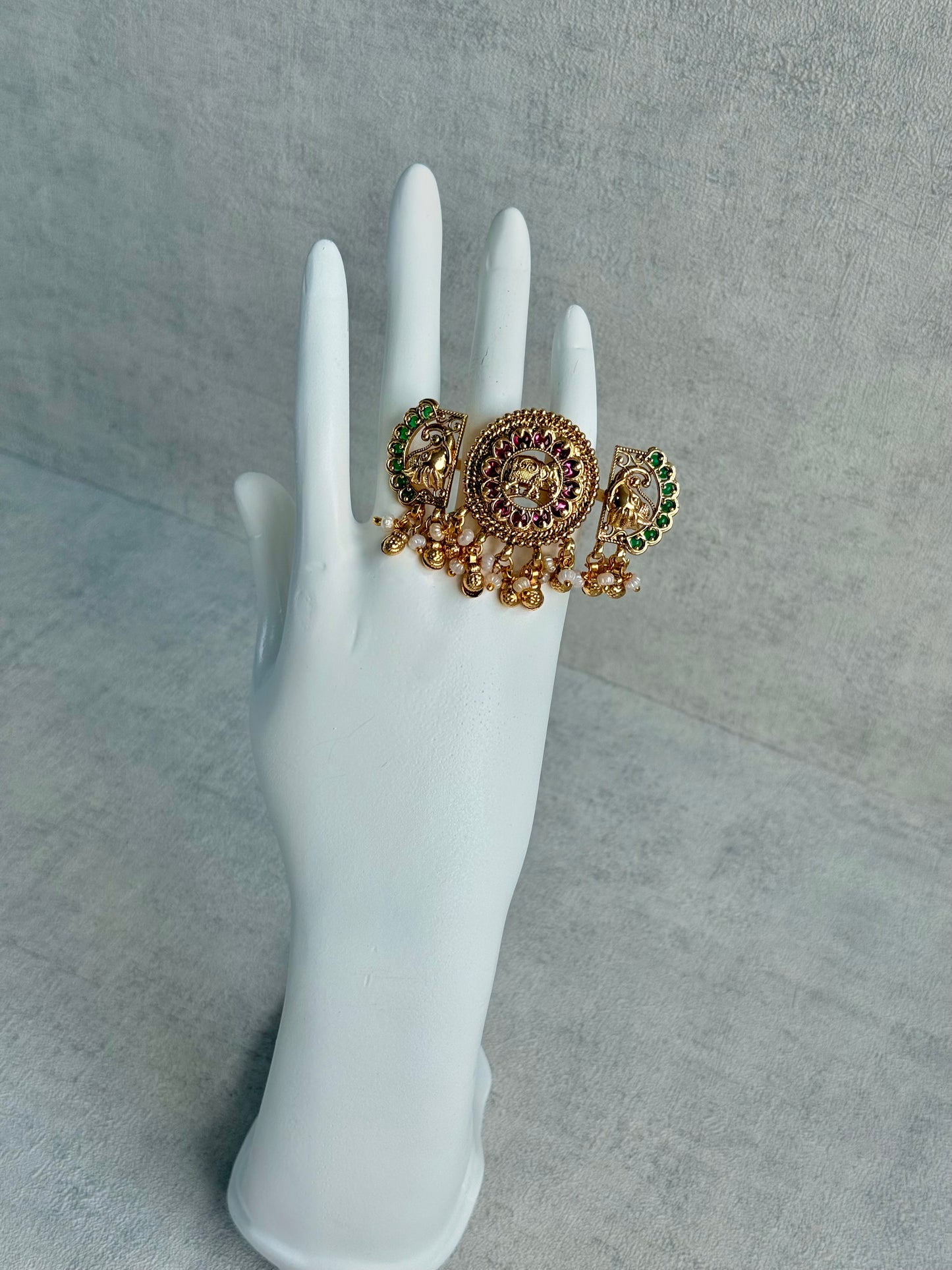 Ayura Designs Nira Adjustable Ring – Jadau-Inspired Gold Elephant Motifs with Rani Pink & Emerald Green Stones, Pearl Drops & Ghungroos