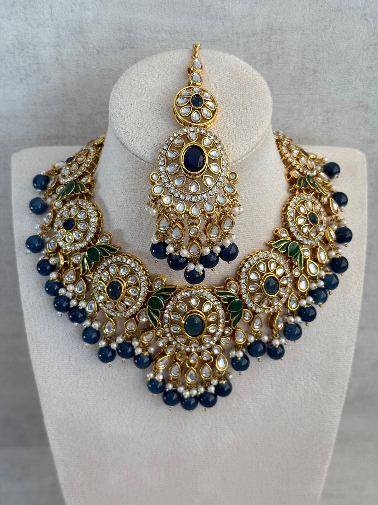 Ayura Designs Zara Set with Necklace, Earrings, Tikka & Passa – Antique Gold with Kundan Detailing & Ink Blue Stones & Beads