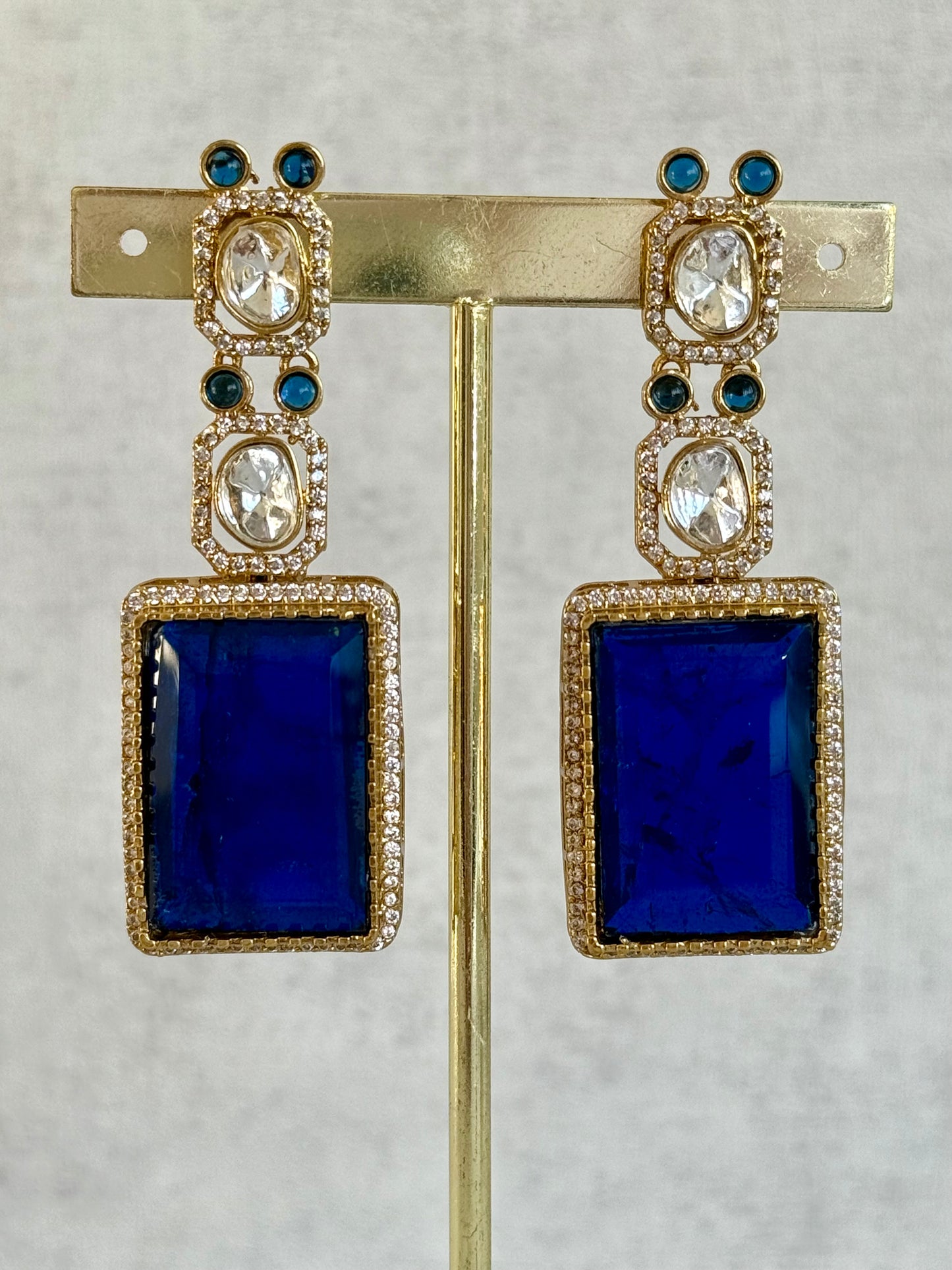 Ayura Designs Clara Set with Earrings & Tikka  – Royal Blue Stones with Moissanite and Antique Gold Finish