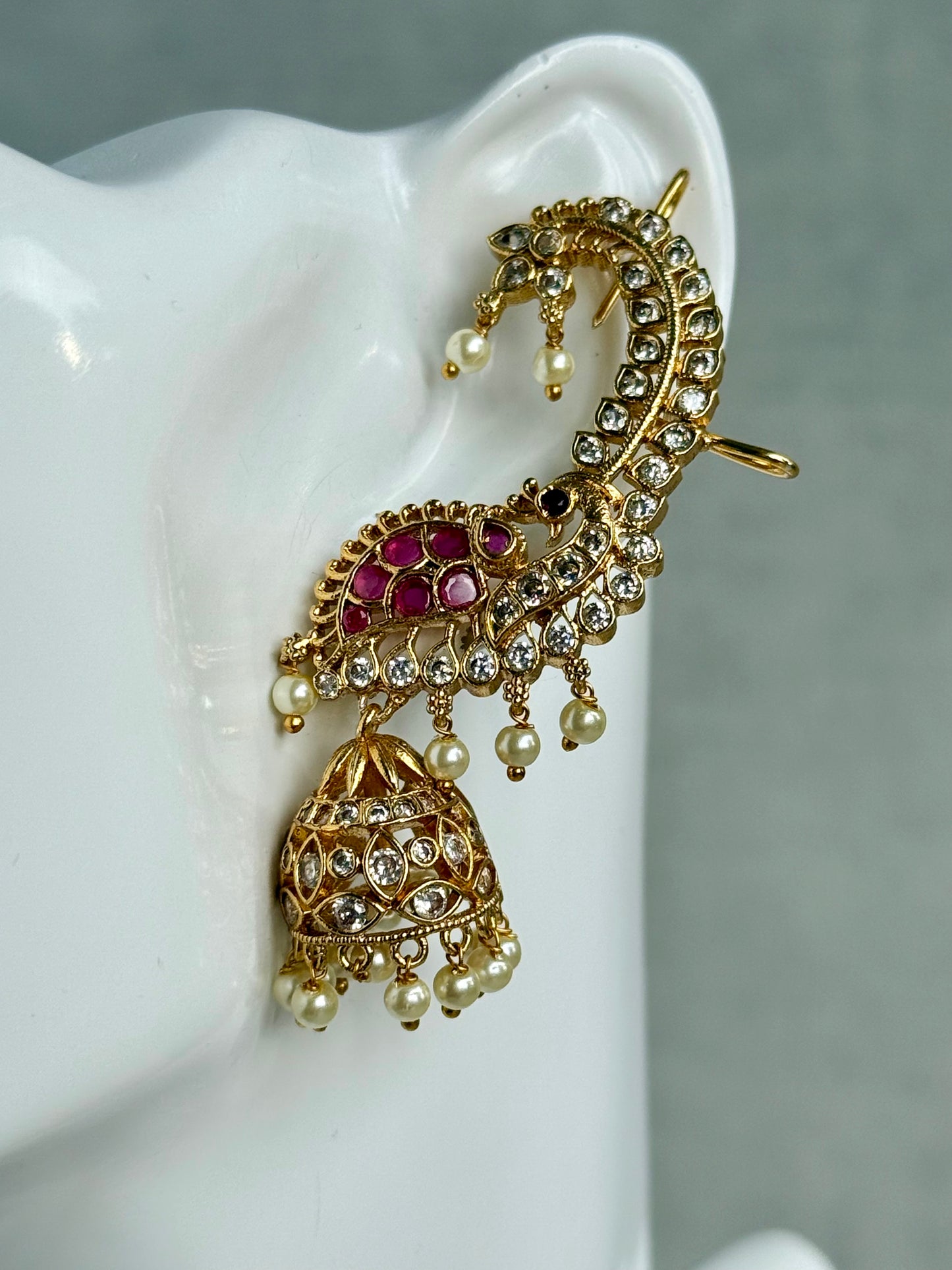 Ayura Designs Padma Earrings – Gold Half Ear Cuffs with Peacock Motif, Pink Stone Accents, Kundan Crystals & Pearl Jhumka Drops