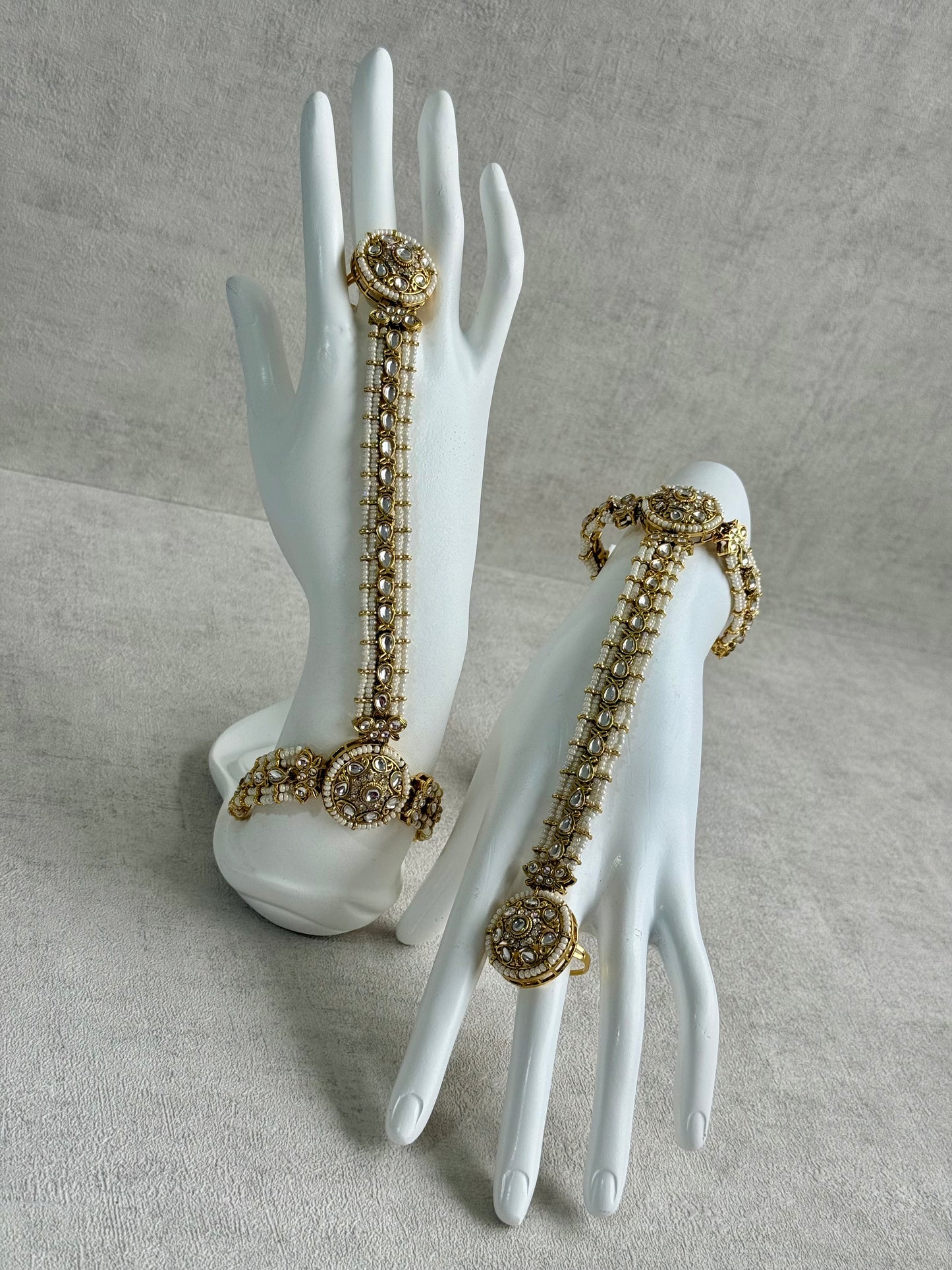 Ayura Designs Mirana Haathphool – Kundan Hand Harness with Pearl Detailing in Antique Gold Finish