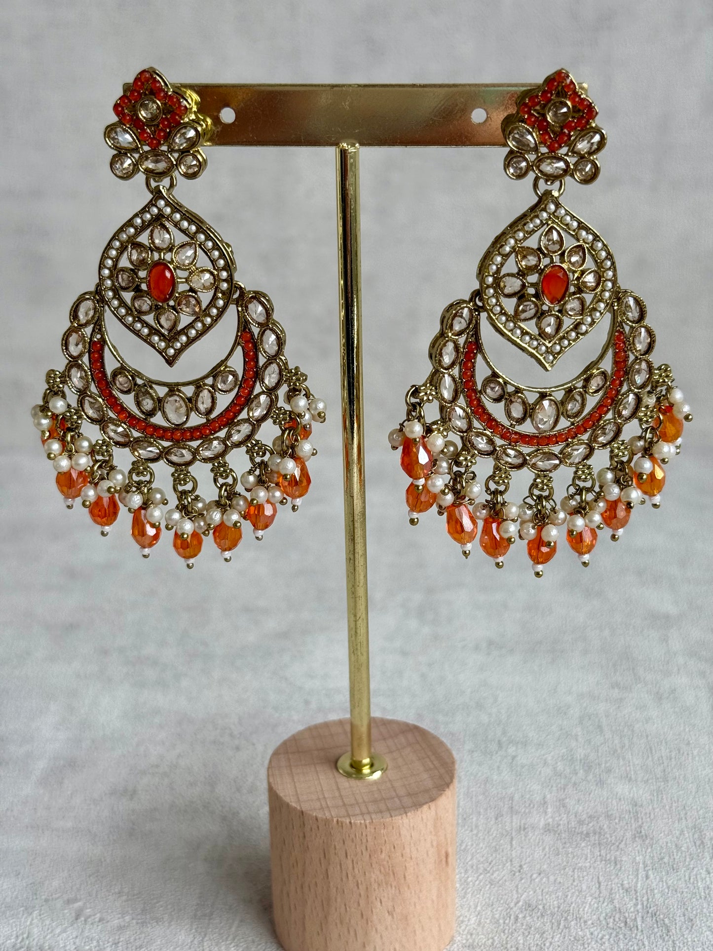 Ayura Designs Jazba Set with Necklace, Jhumkis & Tikka – Antique Gold, Mirror-Cut Stones, Pearl Detailing & Fiery Orange Beads