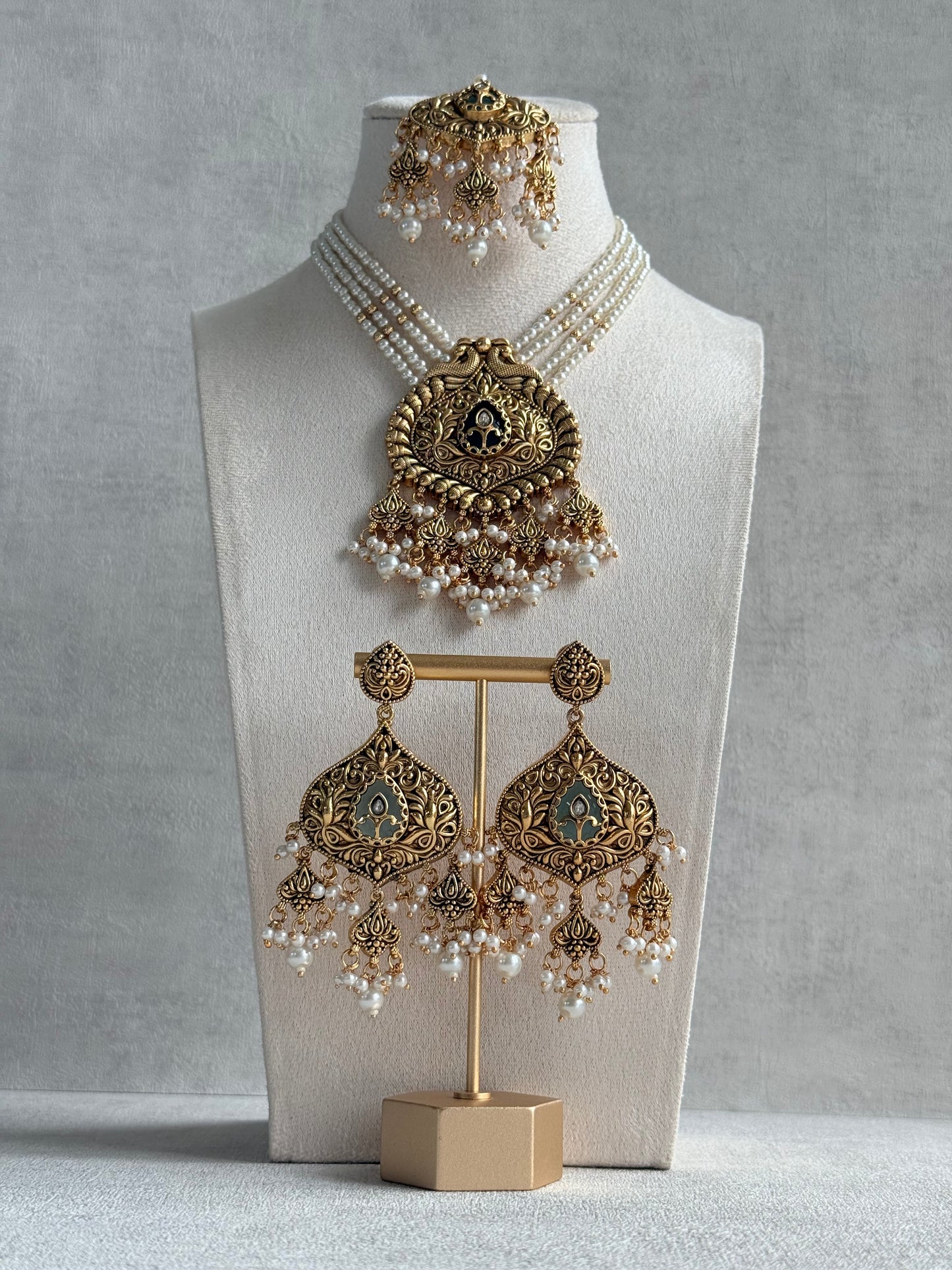 Ayura Designs Afia Necklace Set with Earrings & Tikka – Antique Gold, Ivory Pearls, Green Centre Stone & Peacock Motifs
