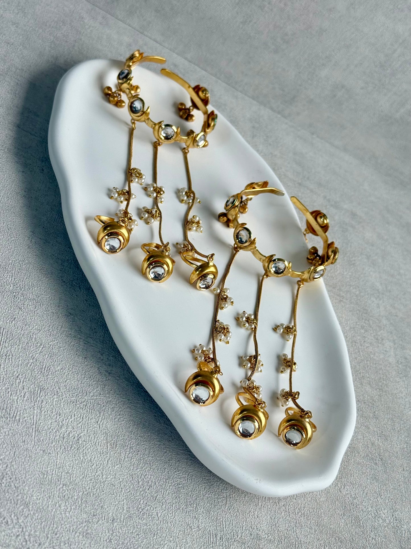 Ayura Designs Chand Haathphool – Antique Gold Hand Harness with Kundan-Style Mirror-Cut Stones & Pearl Detailing