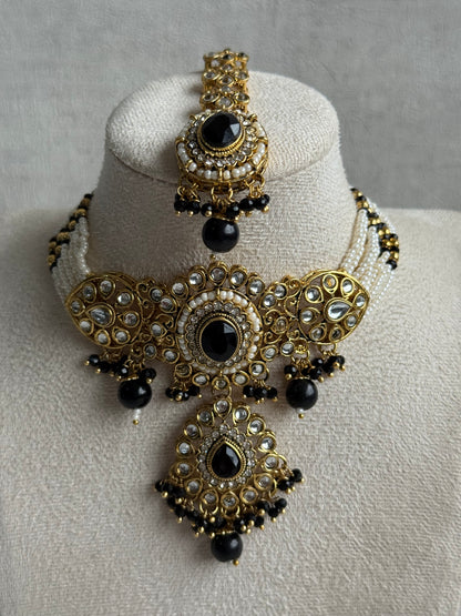 Ayura Designs Muskaan Set – Choker, Jhumkis & Tikka with Black Beads, Kundan Stones & Antique Gold Finish