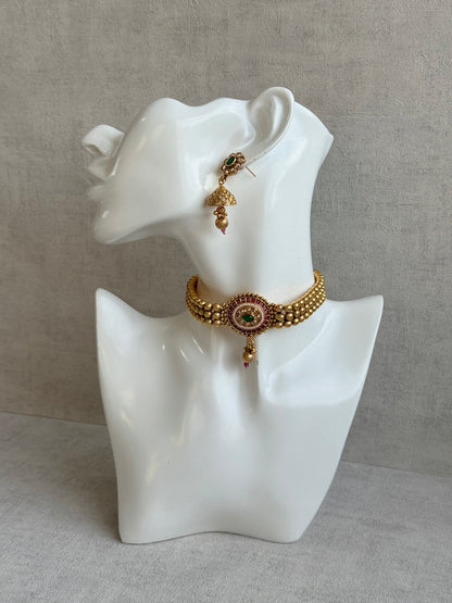 Ayura Designs Kavish Choker Set – Antique Gold Choker with Jhumkis in Rani Pink & Emerald Green with Pearl Detailing