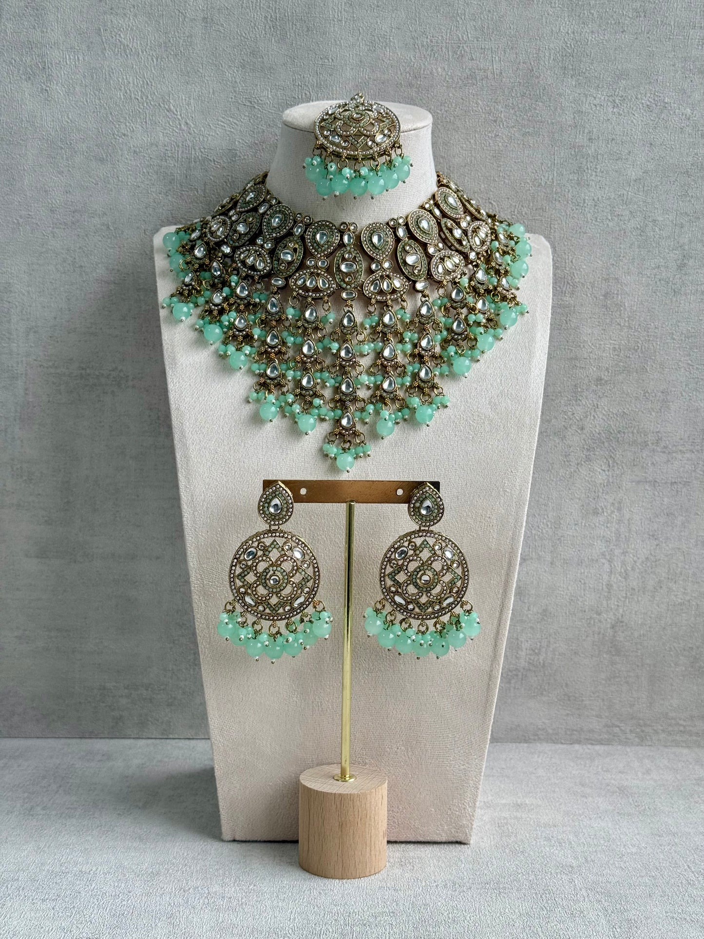 Ayura is Designs Tanya Bridal Set with Necklace, Earrings & Tikka – Pistachio Mint Beads, Mirror-Cut Stones and Antique Gold Finish