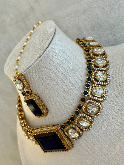 Ayura Designs Clara Set with Earrings & Tikka  – Royal Blue Stones with Moissanite and Antique Gold Finish