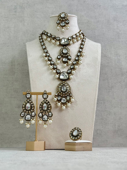 Ayura Designs Kalika Set with Necklace, Earrings, Tikka & Ring – Polki-Style Stones with Antique Green Enamel Detailing & Pearl Drops