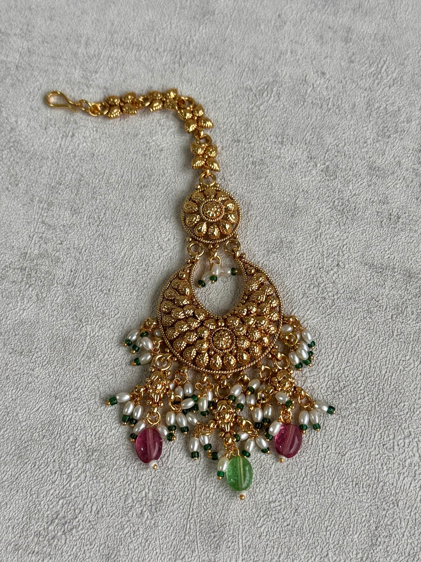 Ayura Designs Rummy Set – Opulent Gold Adornment with Radiant Pink, Green & White Beads | Includes Earrings & Tikka