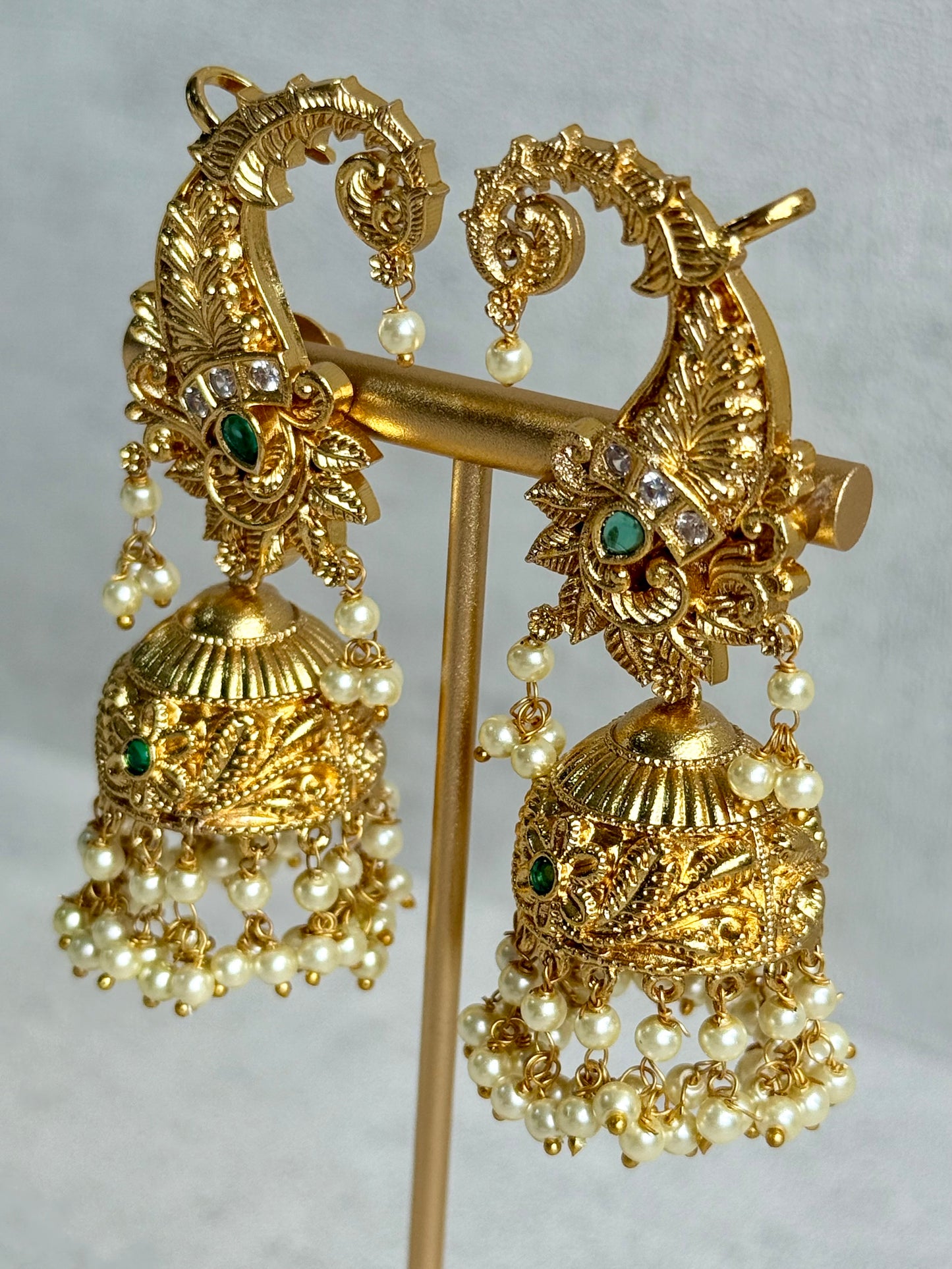 Ayura Designs Anika Jhumkis – Gold Half Ear Cuffs with Peacock Motif, Green Stone Accents, Kundan Crystals & Pearl Jhumka Drops