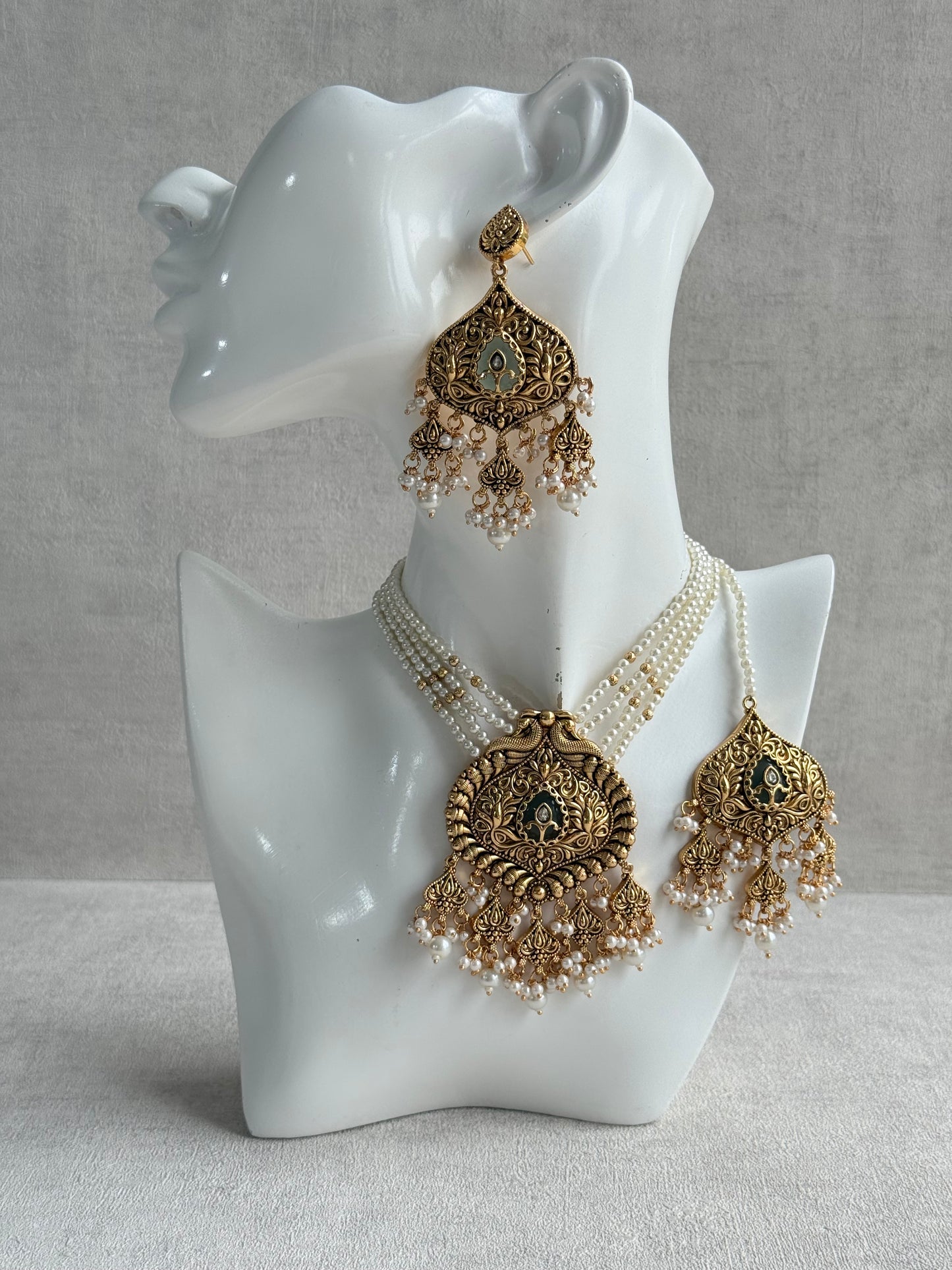 Ayura Designs Afia Necklace Set with Earrings & Tikka – Antique Gold, Ivory Pearls, Green Centre Stone & Peacock Motifs