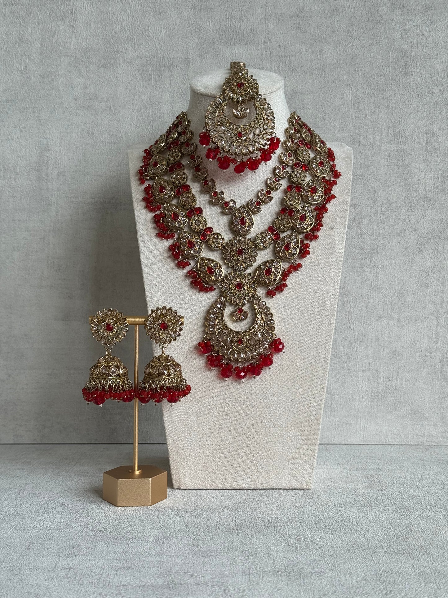 Ayura Designs Samreen Set with Tikka & Jhumkis – in Antique Gold with Red Beads & Mirror-Cut Stones