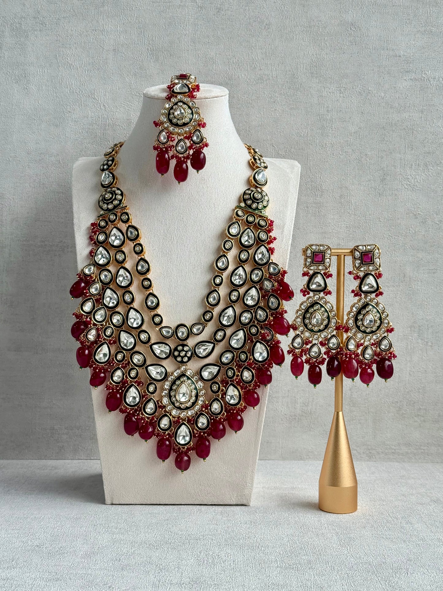 Ayura Designs Zahira Bridal Set with Necklace, Earrings & Tikka – Kundan Detailing with Green Enamel, Ruby Pink Stones & Maroon Bead Drops