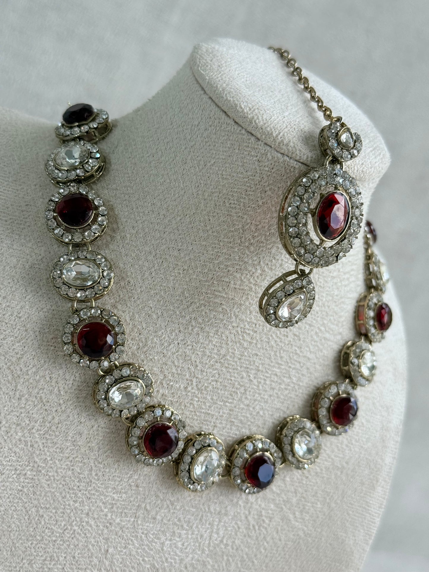 Ayura Designs Eira Necklace Set with Earrings & Tikka – Ruby Red & Crystal Stones with Antique Gold Finish