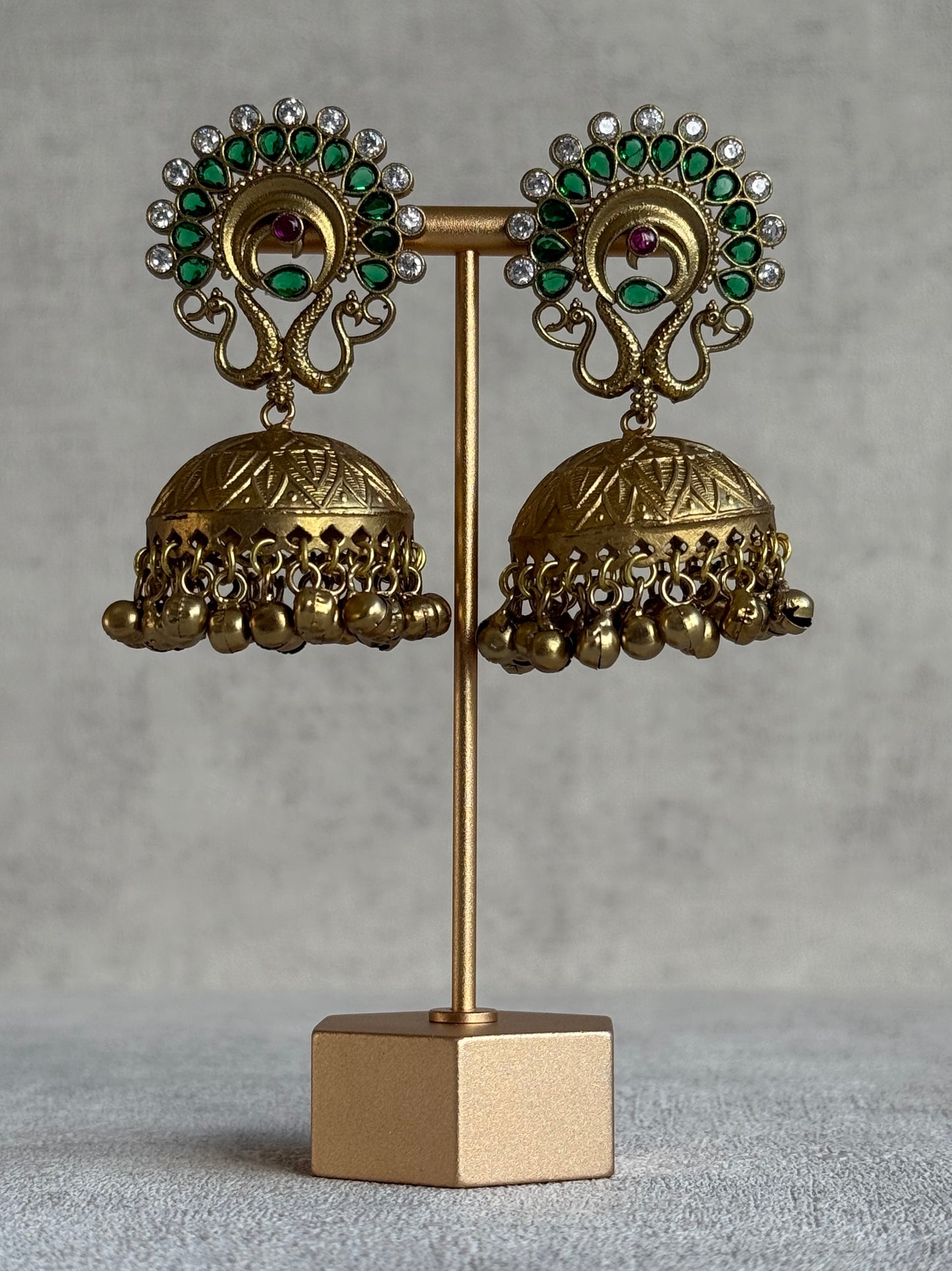Ayura Designs Moraya Jhumkis – Emerald Green Peacock Motif with Antique Gold Detailing
