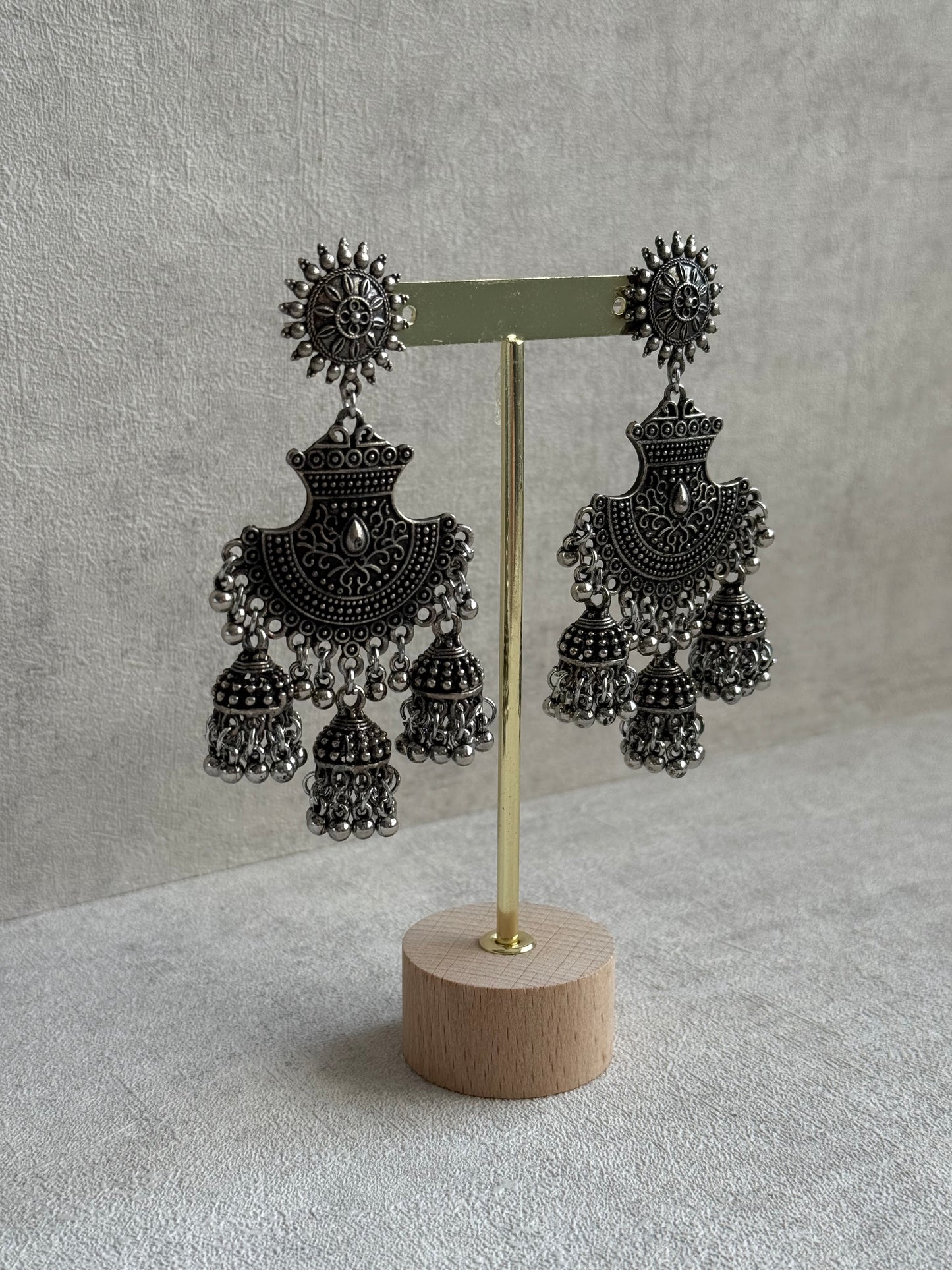 Ayura Designs Mahfar Earrings – Oxidised Silver Jhumkas with Sunburst Tops & Triple Dome Drops