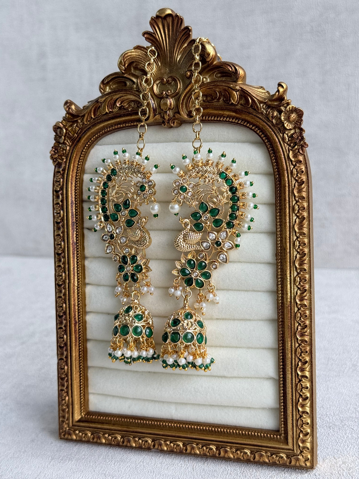 Ayura Designs Nitya Kaanphool Jhumkis – Gold Peacock Motifs, Emerald Green Kundan & Pearl Drops with Attached Sahare