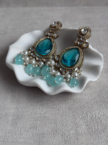 Ayura Designs Nageen Earrings – Antique Gold Jhumkis with Aqua Blue Stones, Mirror-Cut Accents & Pearl Drops